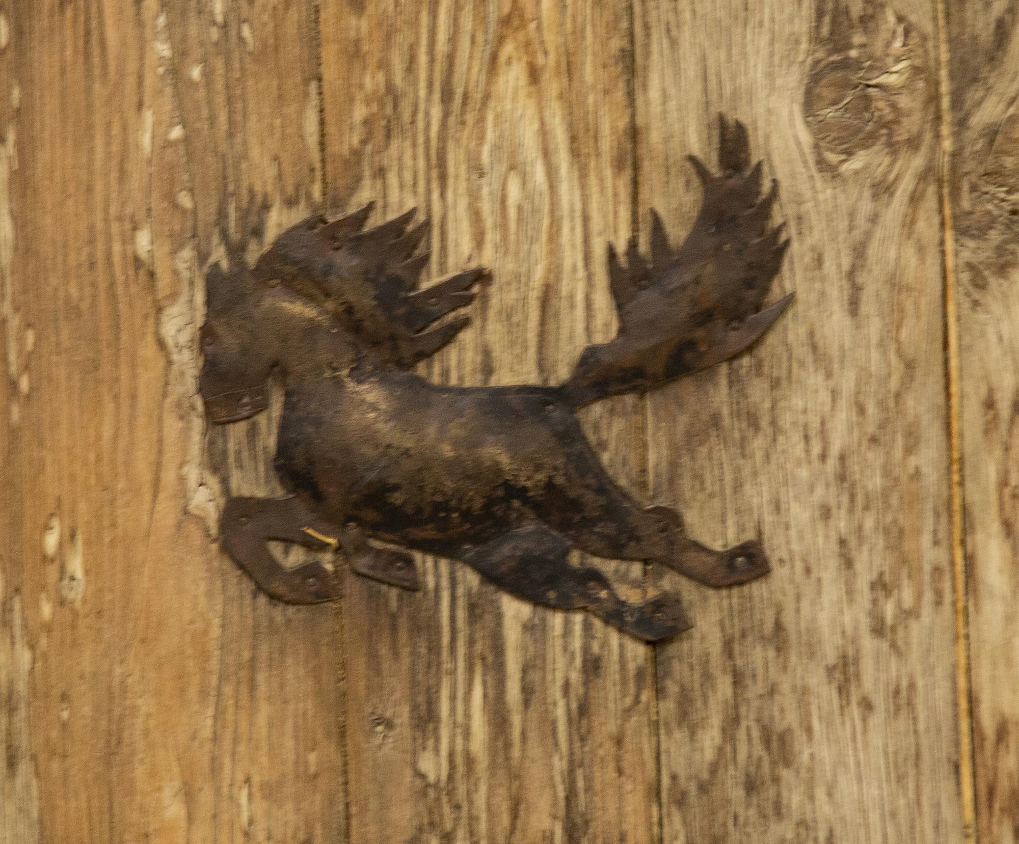 A Pair of Continental Iron Mounted Weathered Oak Doors — 19th Century