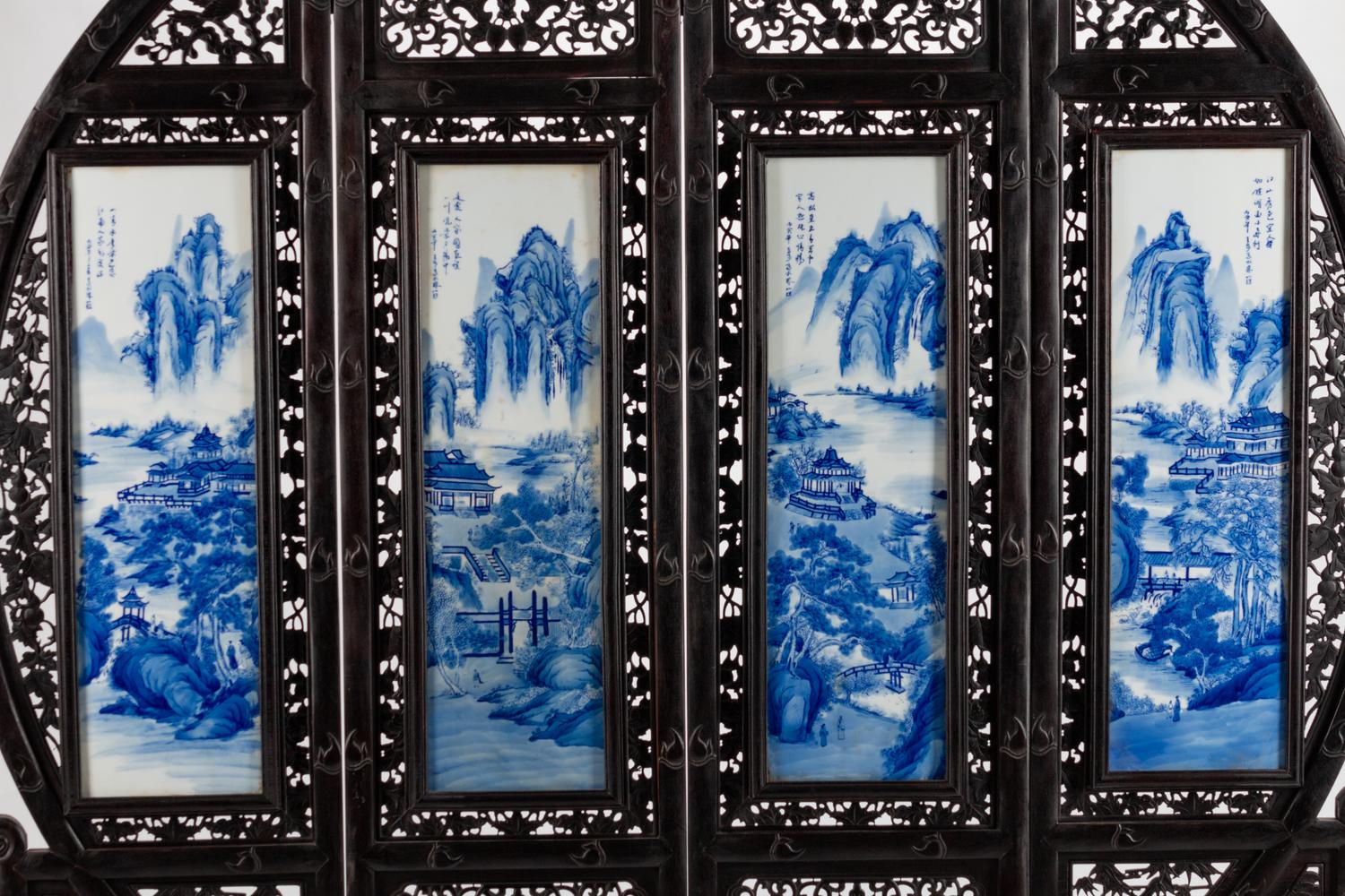 A Chinese Blue and White Porcelain-Mounted Carved Hardwood Four Panel Floor Screen