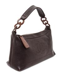 A Chanel Brown Caviar Leather Handbag, 14" x 8" x 5".