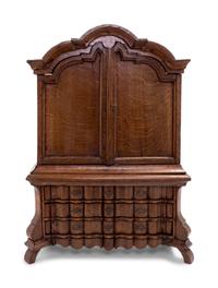A Continental Oak Diminutive Cabinet