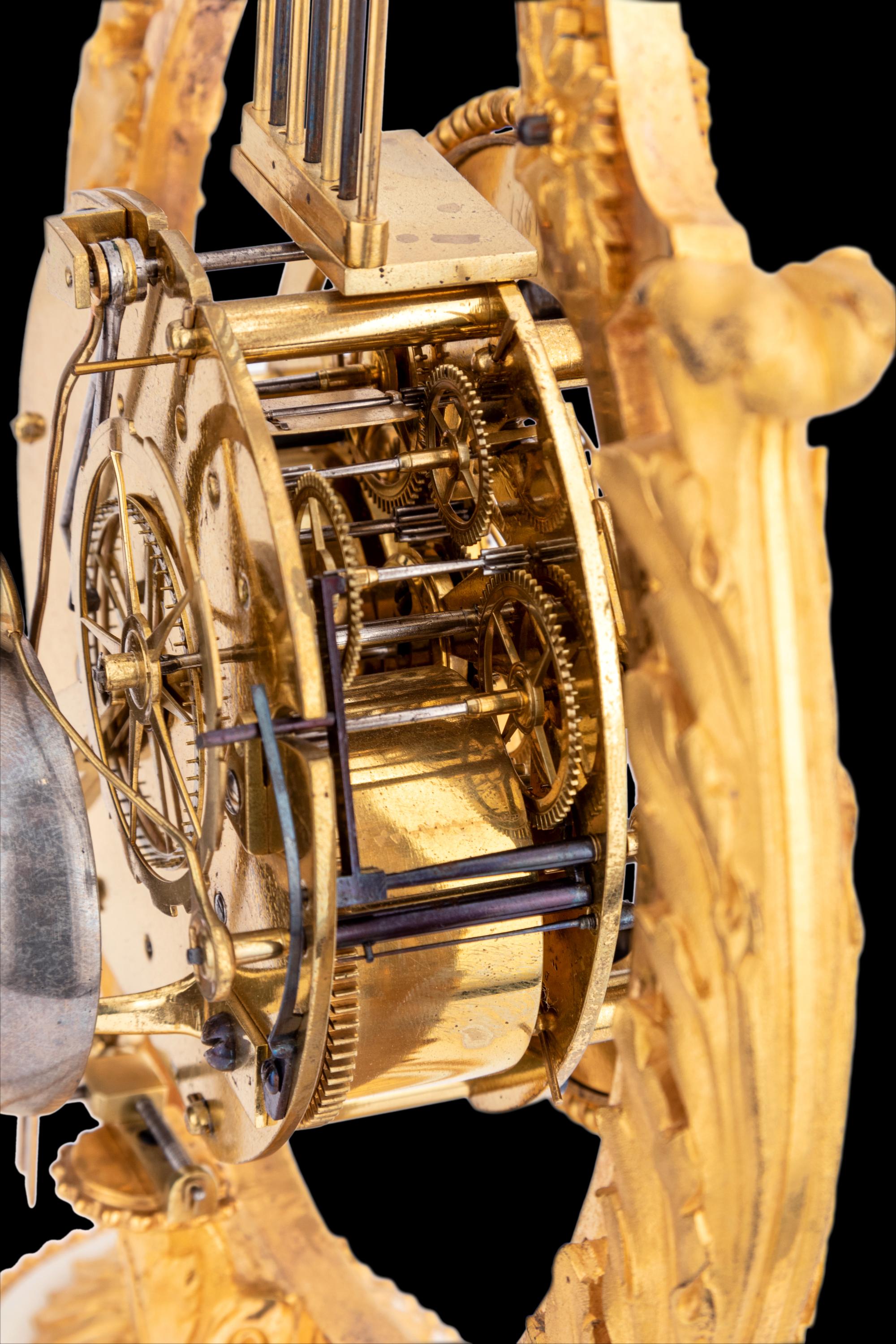 A French Gilt Bronze and Marble Lyre-Form Clock, Bourdier