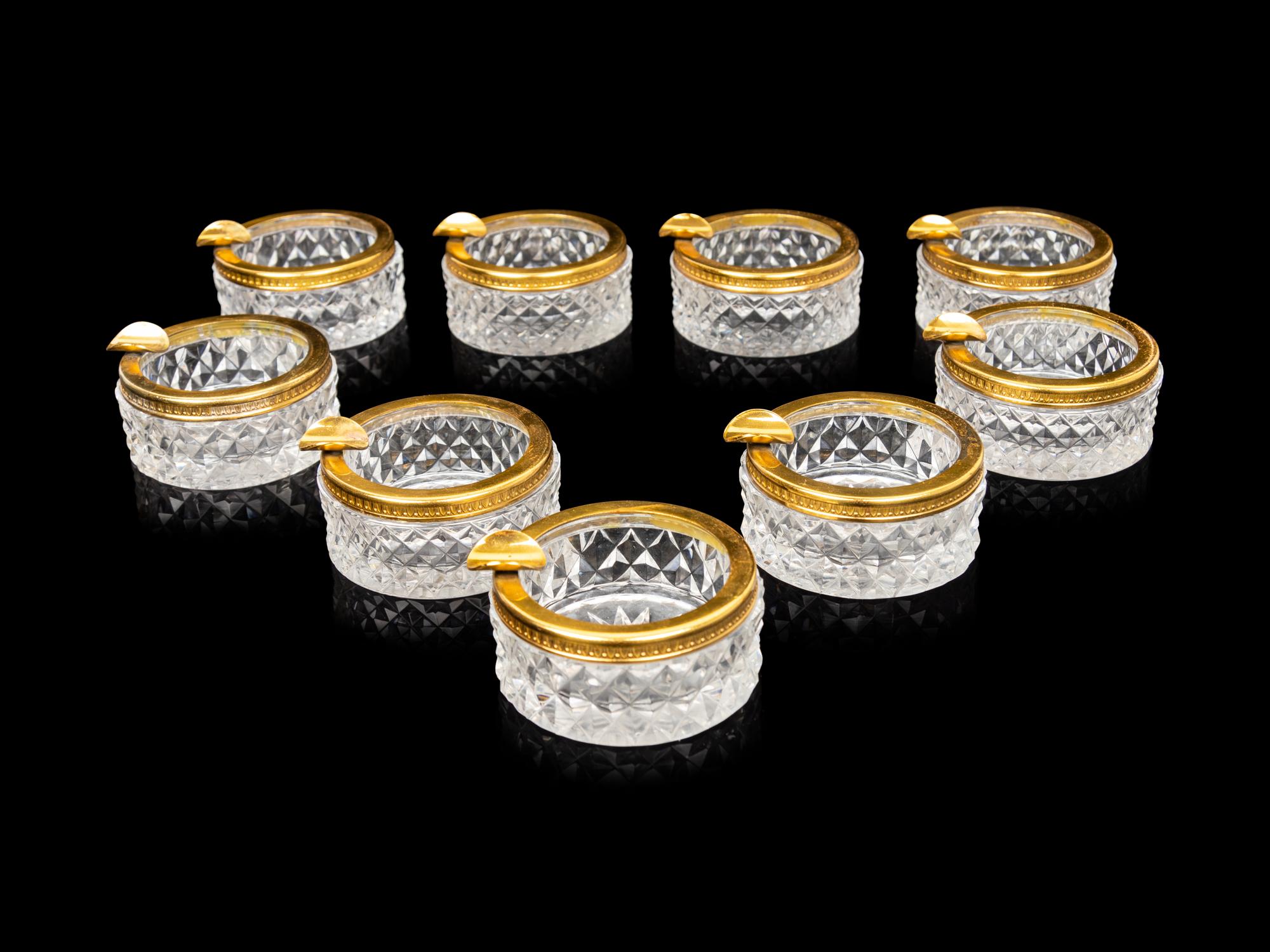 A Set of Nine Small Cut Glass Ash Trays