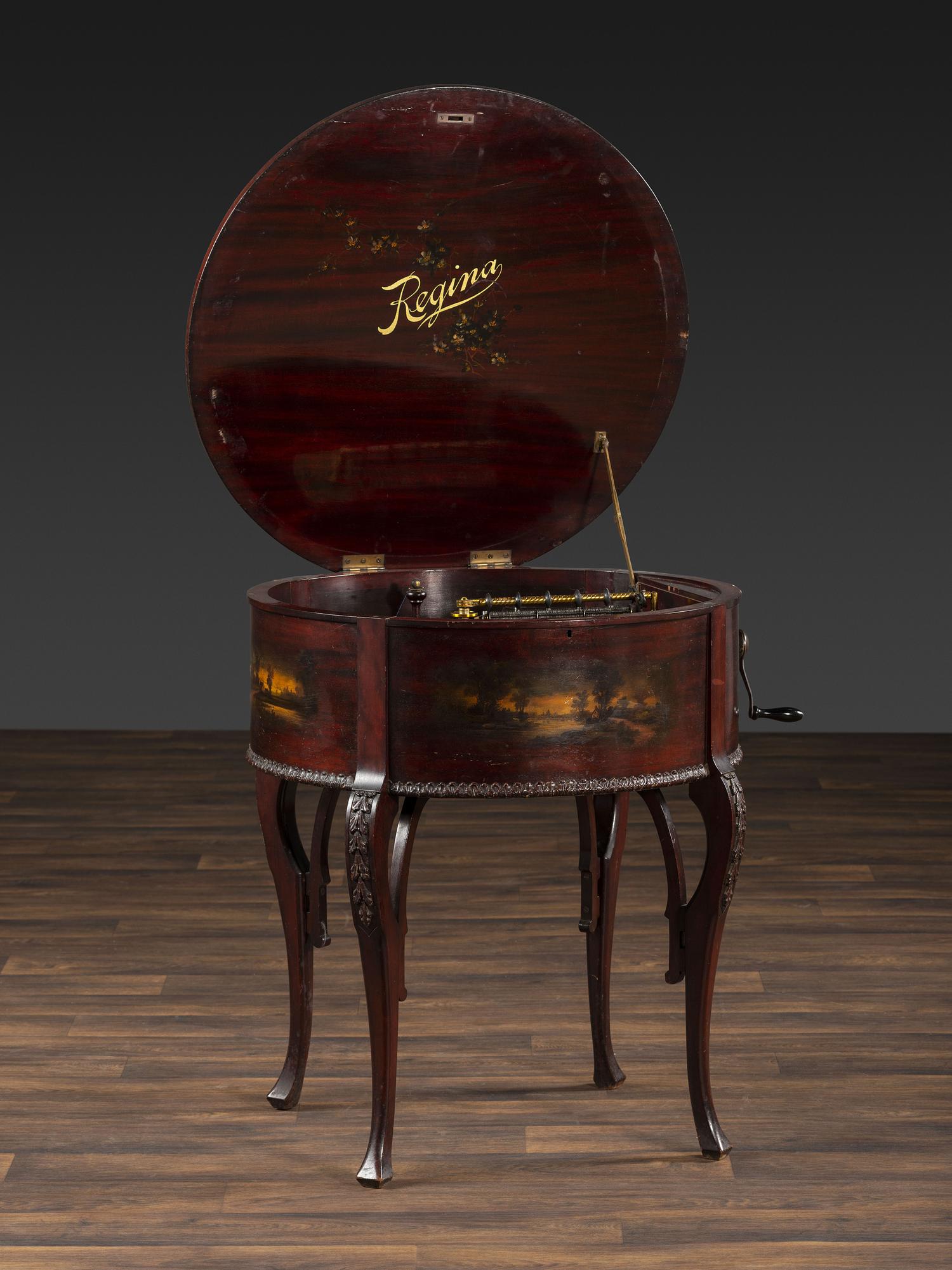 A Regina 'Rookwood ' Paint Decorated 20 Inch Drum Music Box