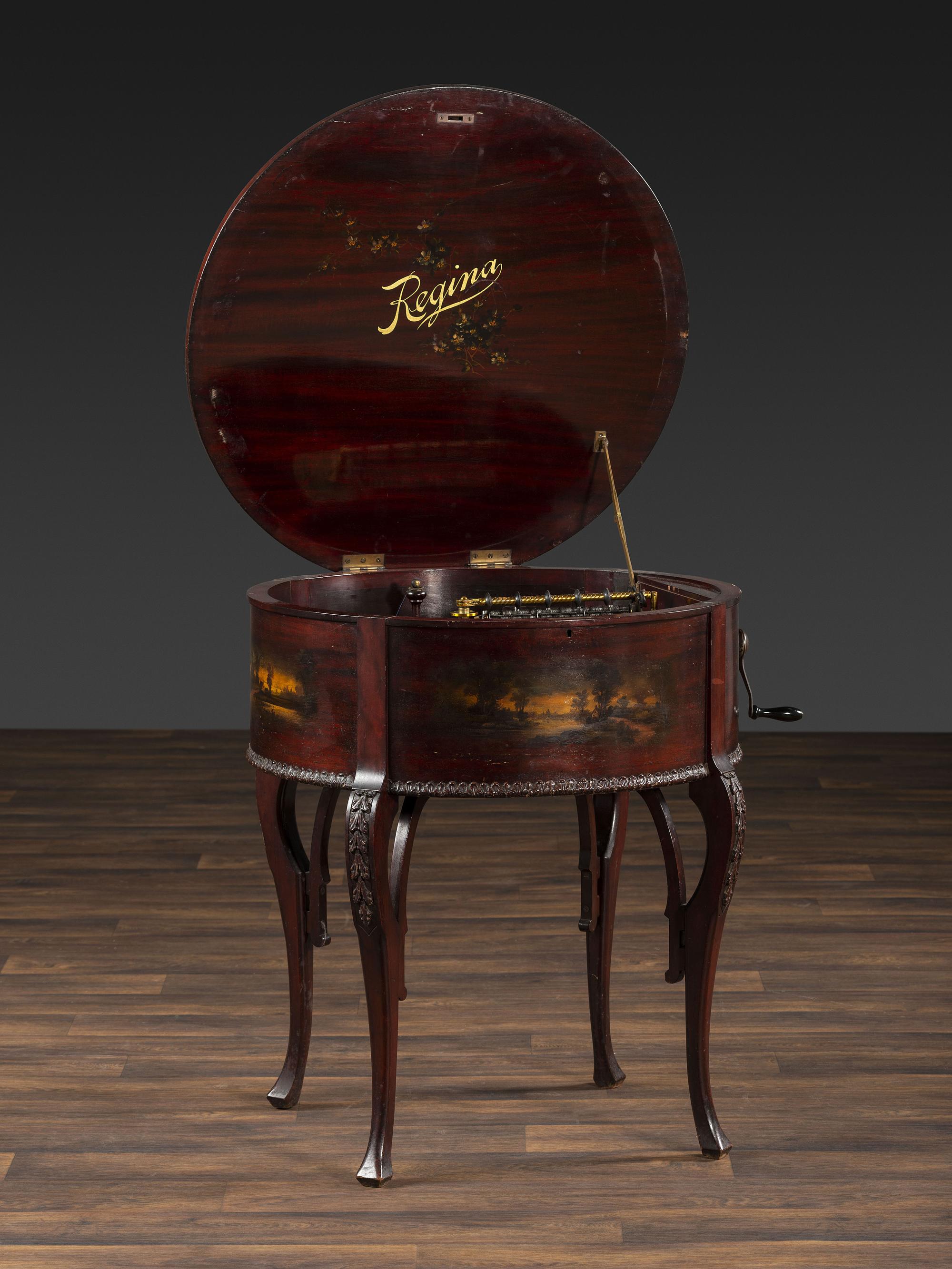 A Regina 'Rookwood ' Paint Decorated 20 Inch Drum Music Box