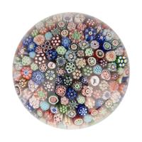 A Miniature Baccarat Close Packed Millefiori and Silhouette Glass Paperweight