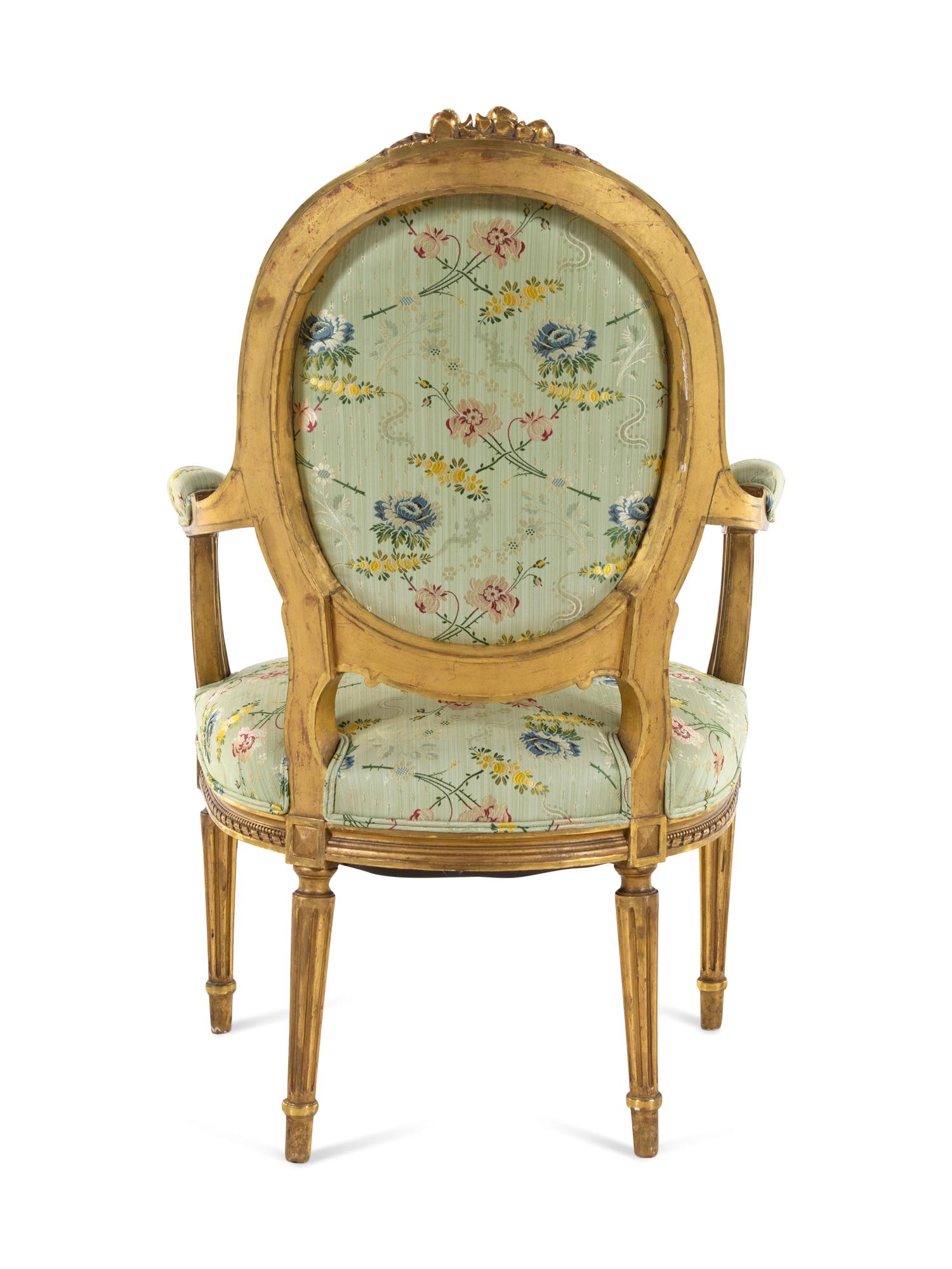 A Set of Four Louis XVI Style Carved Giltwood Fauteuils