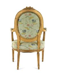 A Set of Four Louis XVI Style Carved Giltwood Fauteuils