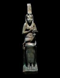An Egyptian Faience Isis Nursing Harpocrates