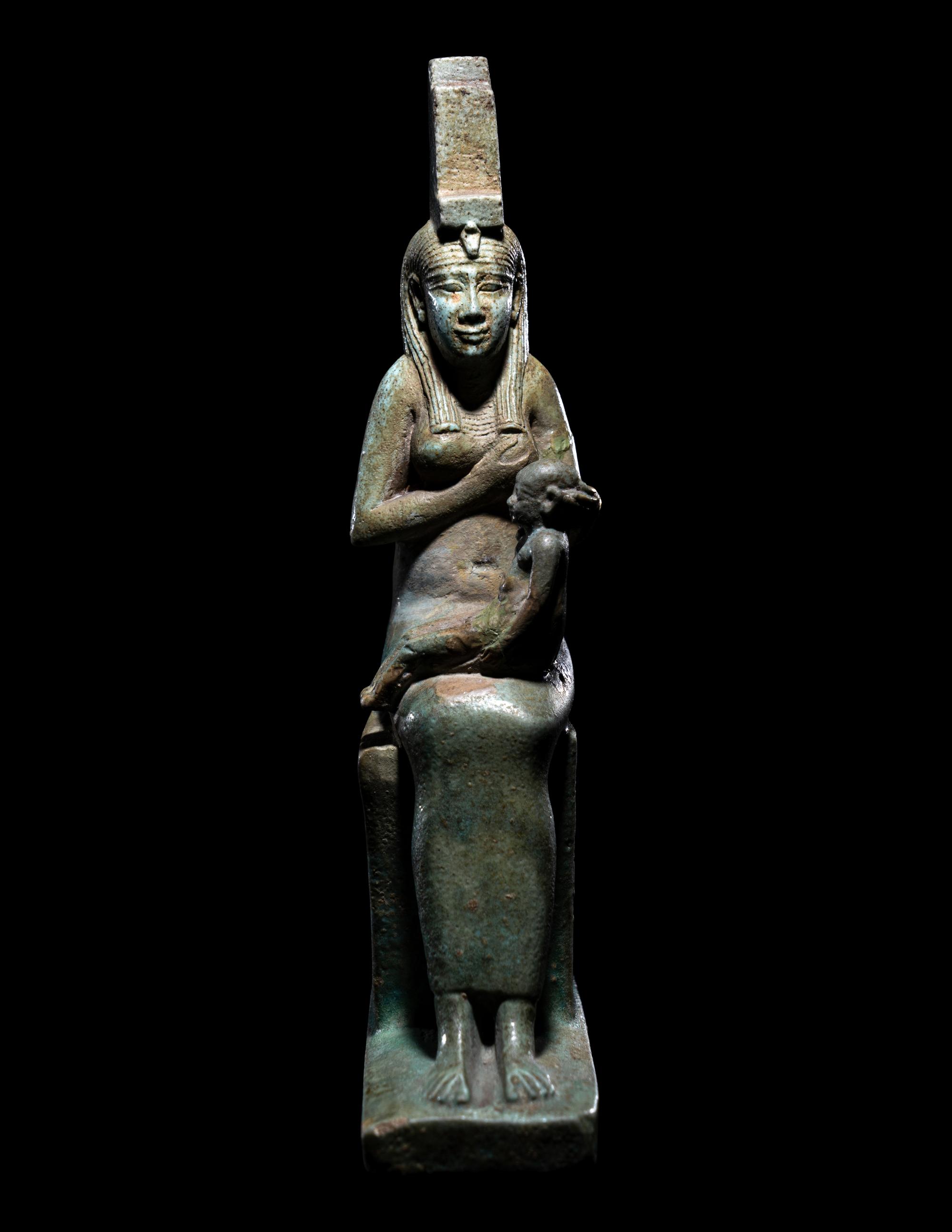 An Egyptian Faience Isis Nursing Harpocrates