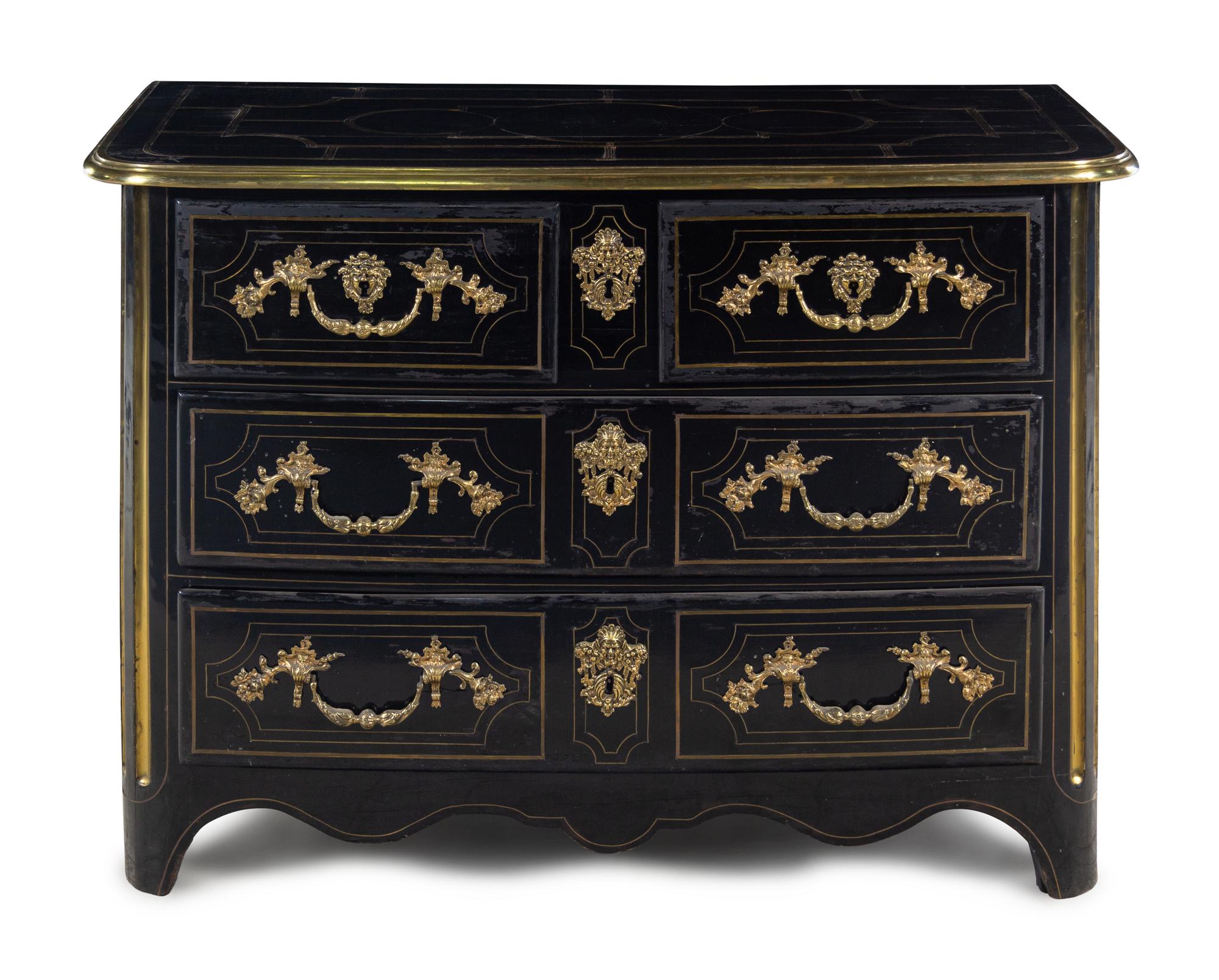 A Régence Gilt Bronze Mounted Ebony Commode