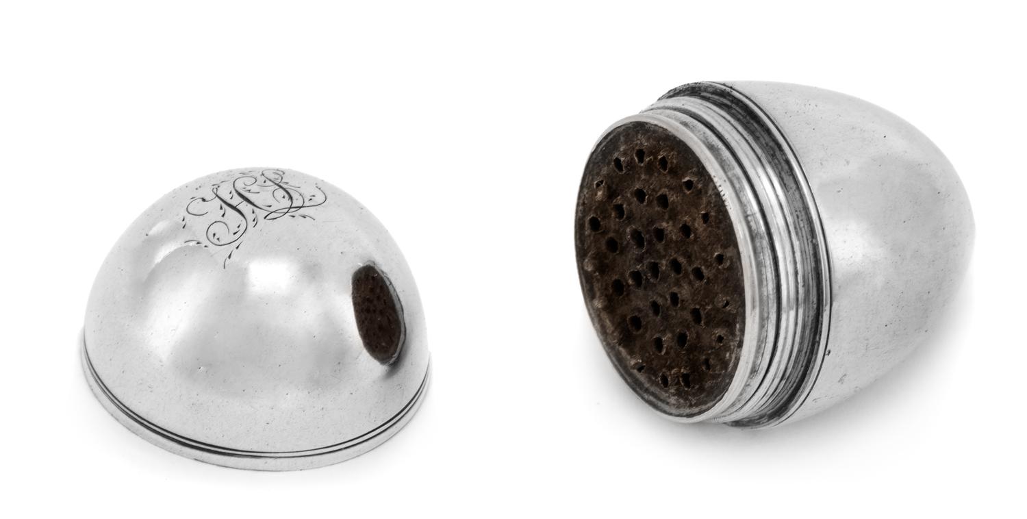 A George III Silver Nutmeg Grater, Likely John Thornton, Birmingham, 1803, of ovoid form, the underside with engraved monogram HL.