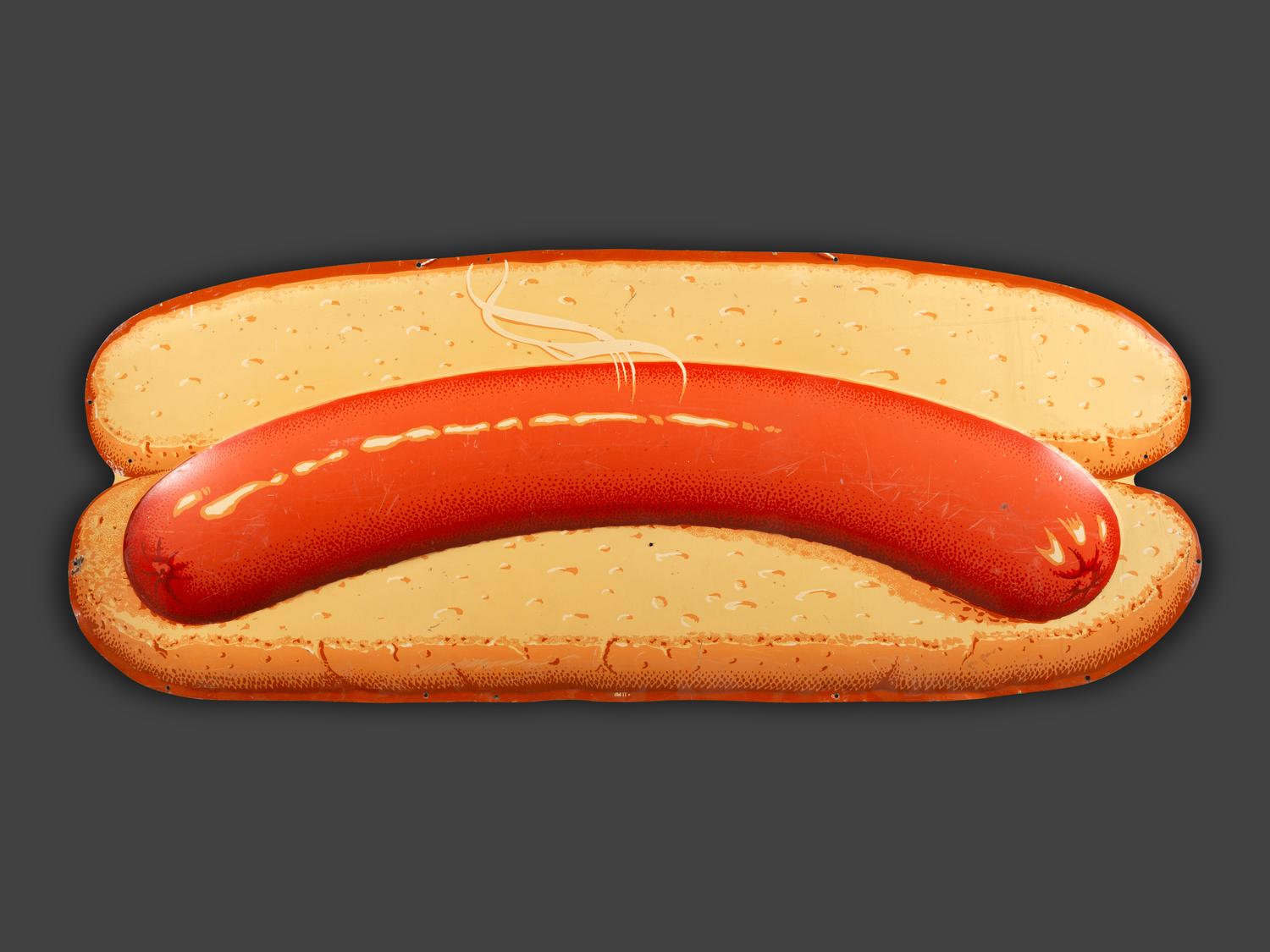 A Coca-Cola Embossed Tin Hot Dog Sign