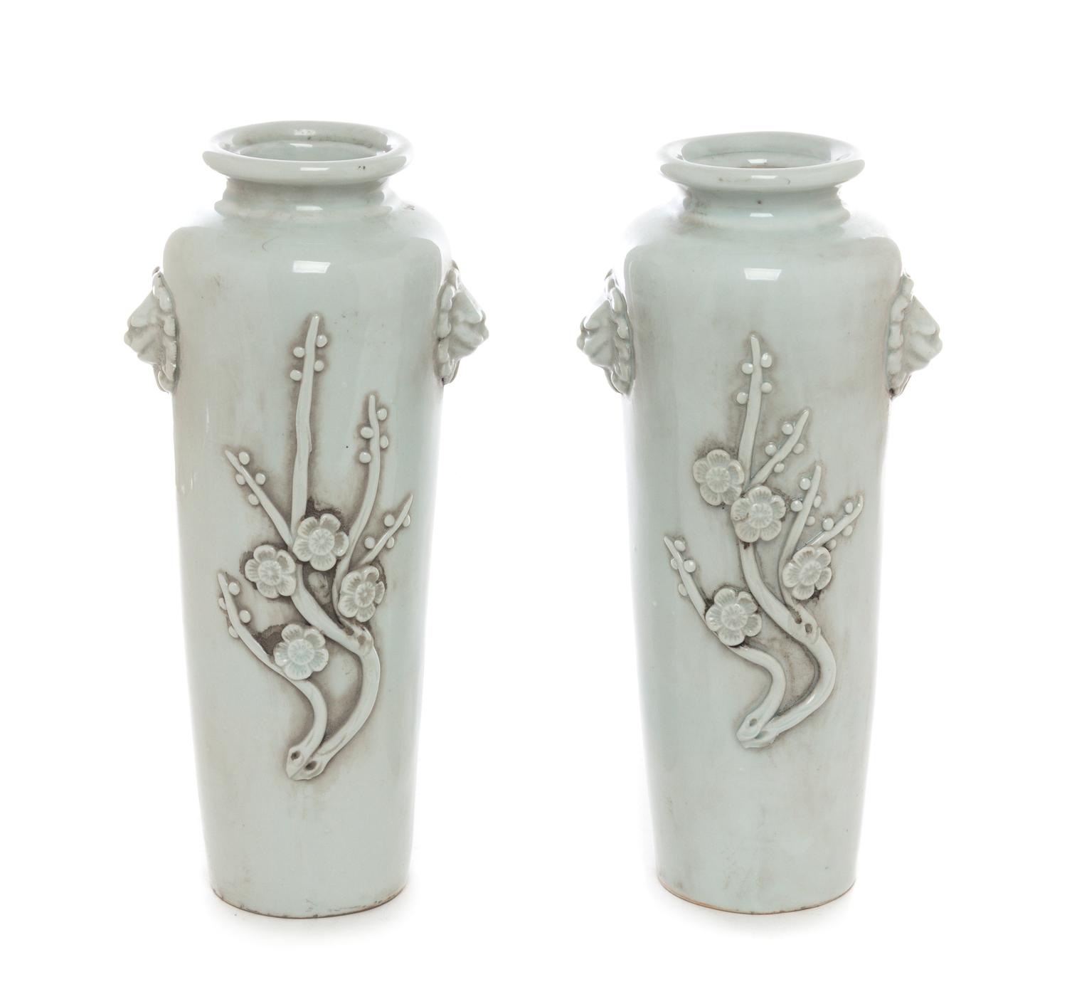 A Pair of Chinese White Glazed Porcelain Vases Height 10 1/4 inches.