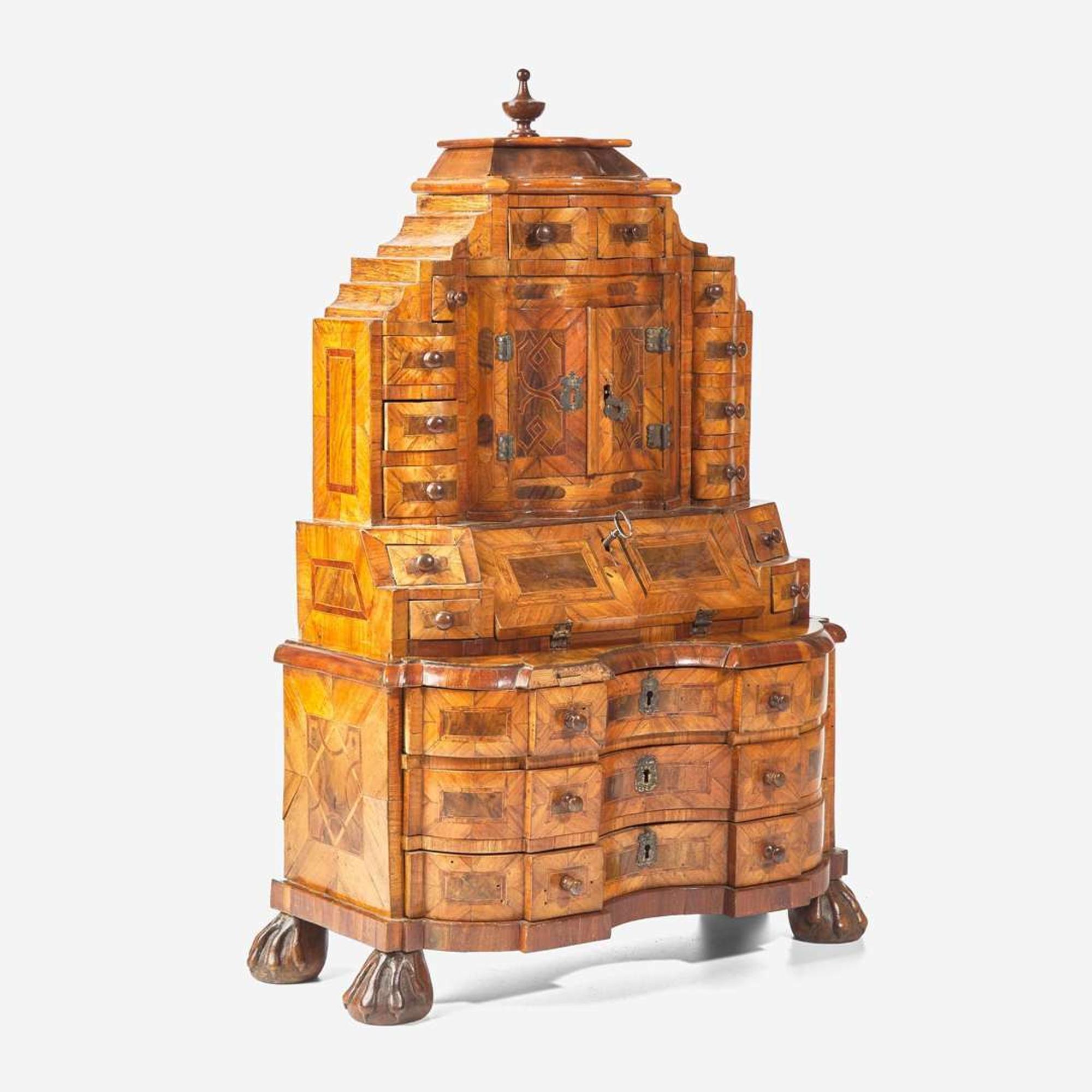 A miniature German Baroque walnut parquetry secretary bookcase 18th century