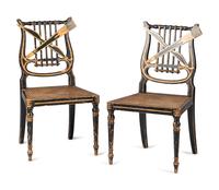 A Pair of Classical Gilt and Black Painted Lyre-Back Cane Upholstered Side Chairs