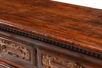 An Italian Baroque Parcel Gilt Walnut Chest of Drawers