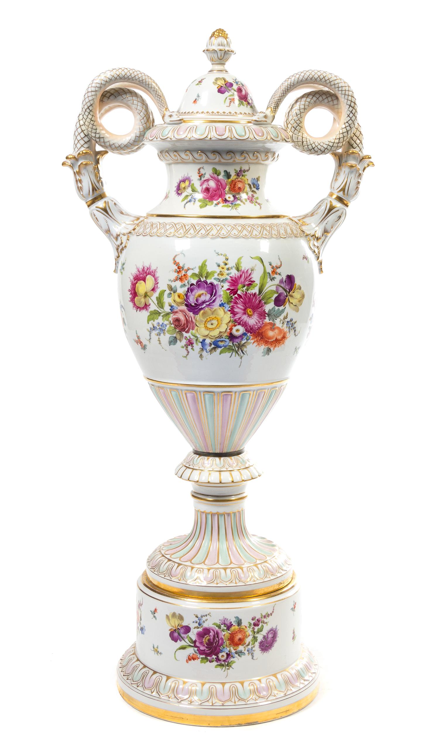 A Dresden Porcelain Urn, Cover and Stand Height overall 44 inches.