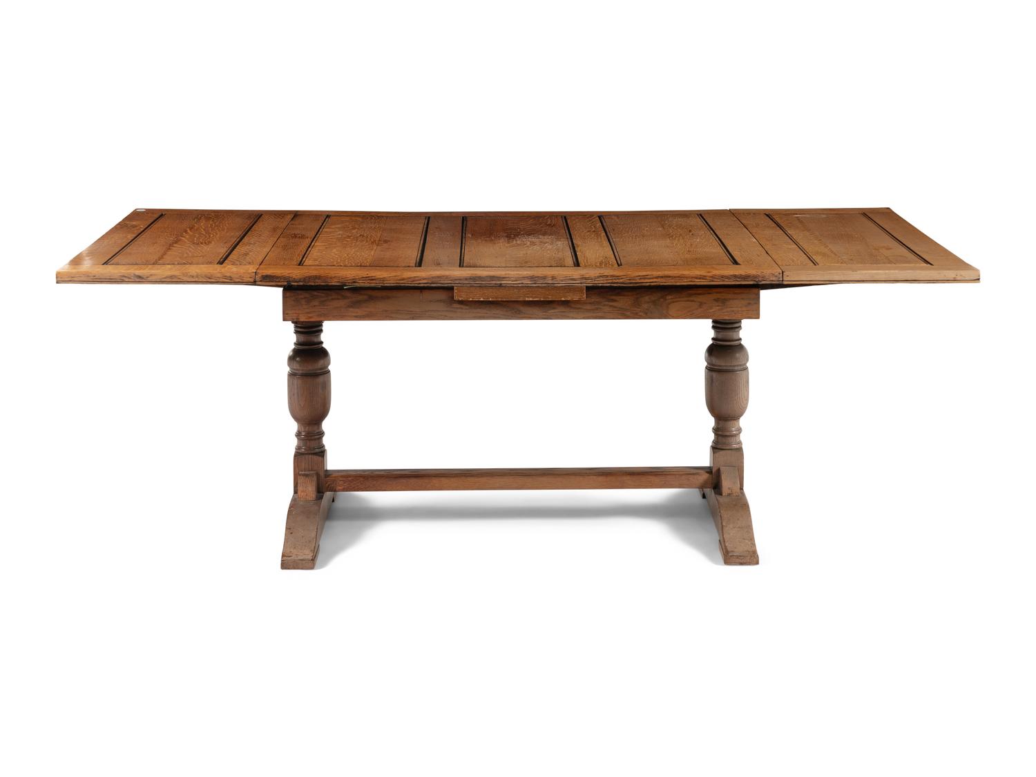 An English Arts and Crafts Oak Extension Dining Table