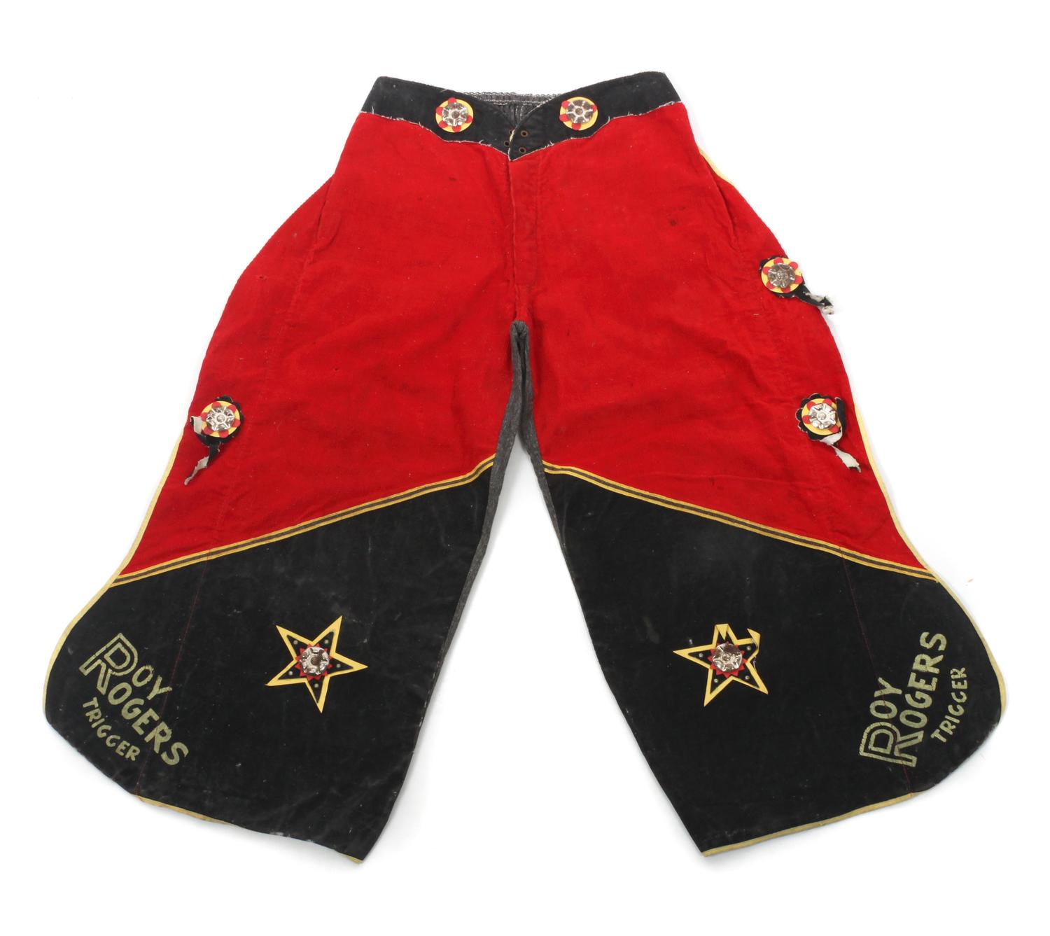 Two Pairs of Children's Chaps and a pair of Gauntlets Length of chaps 30 inches.