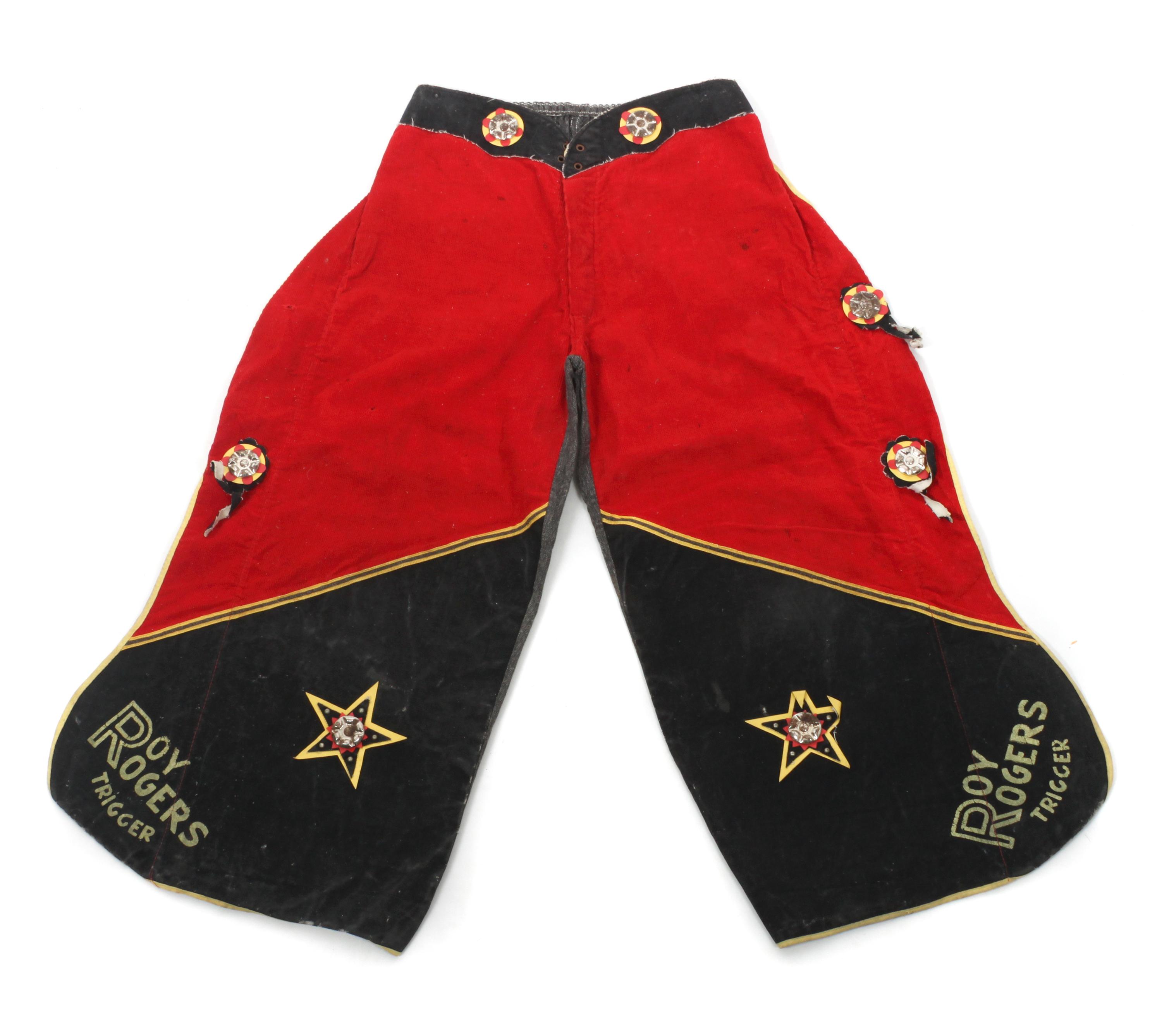 Two Pairs of Children's Chaps and a pair of Gauntlets Length of chaps 30 inches.