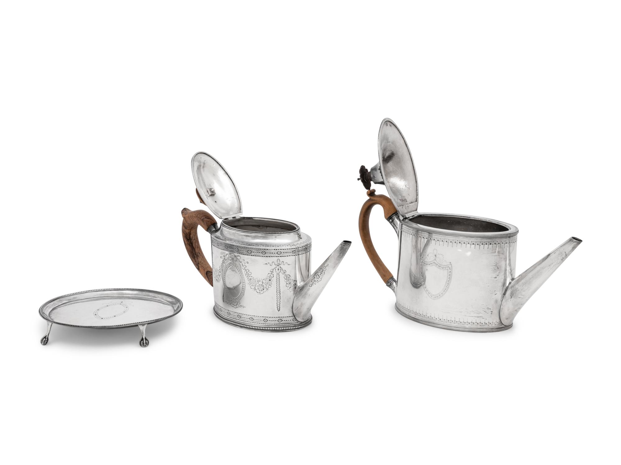 Two Hester Bateman George III Silver Teapots and a Teapot Stand