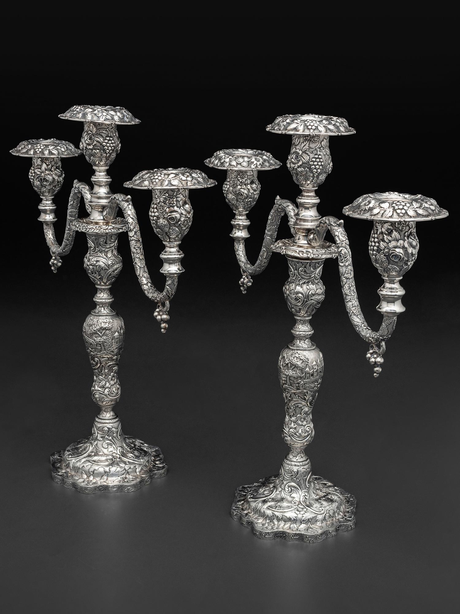 A Pair of American Repousse Silver Candelabra