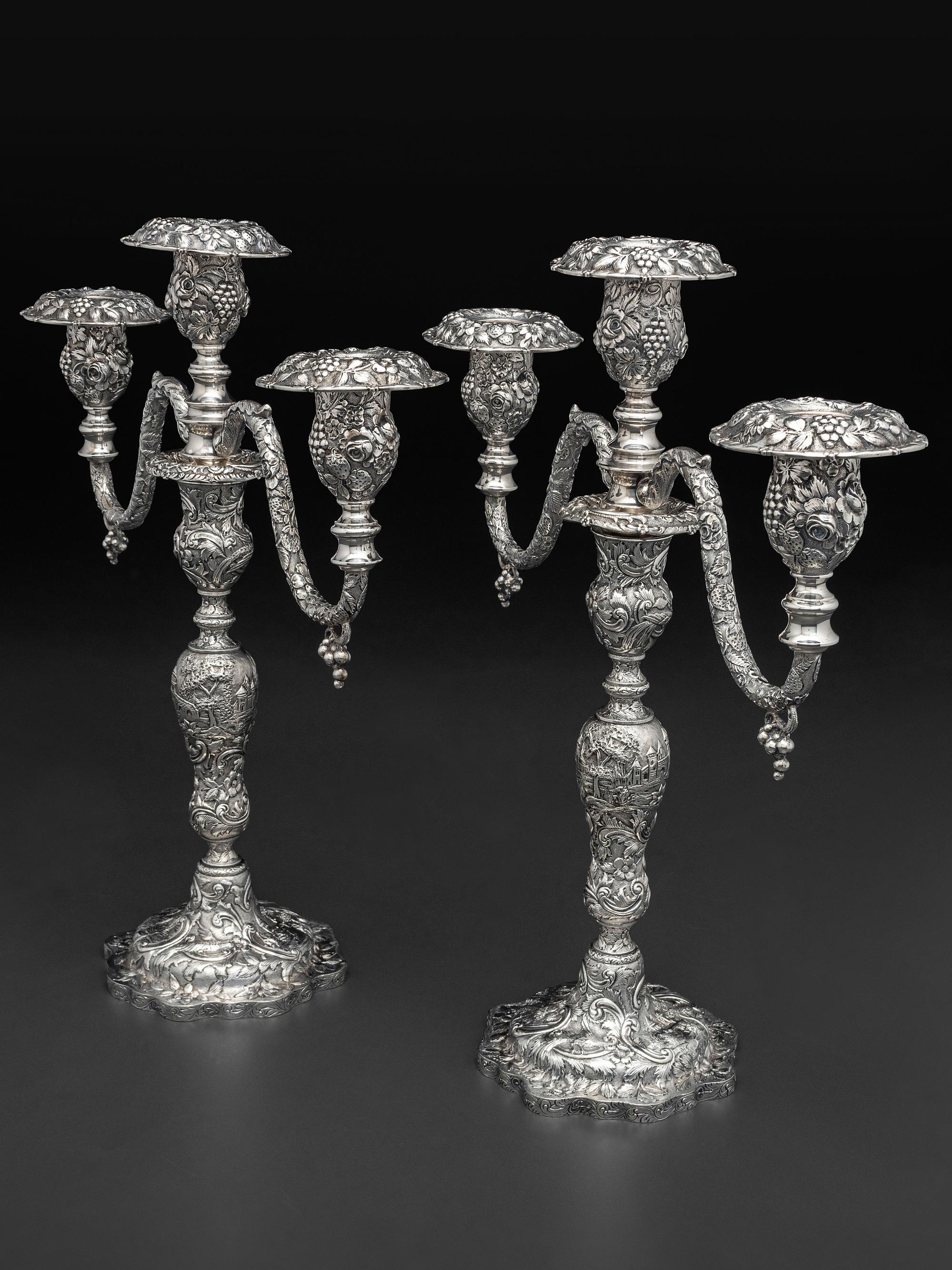 A Pair of American Repousse Silver Candelabra