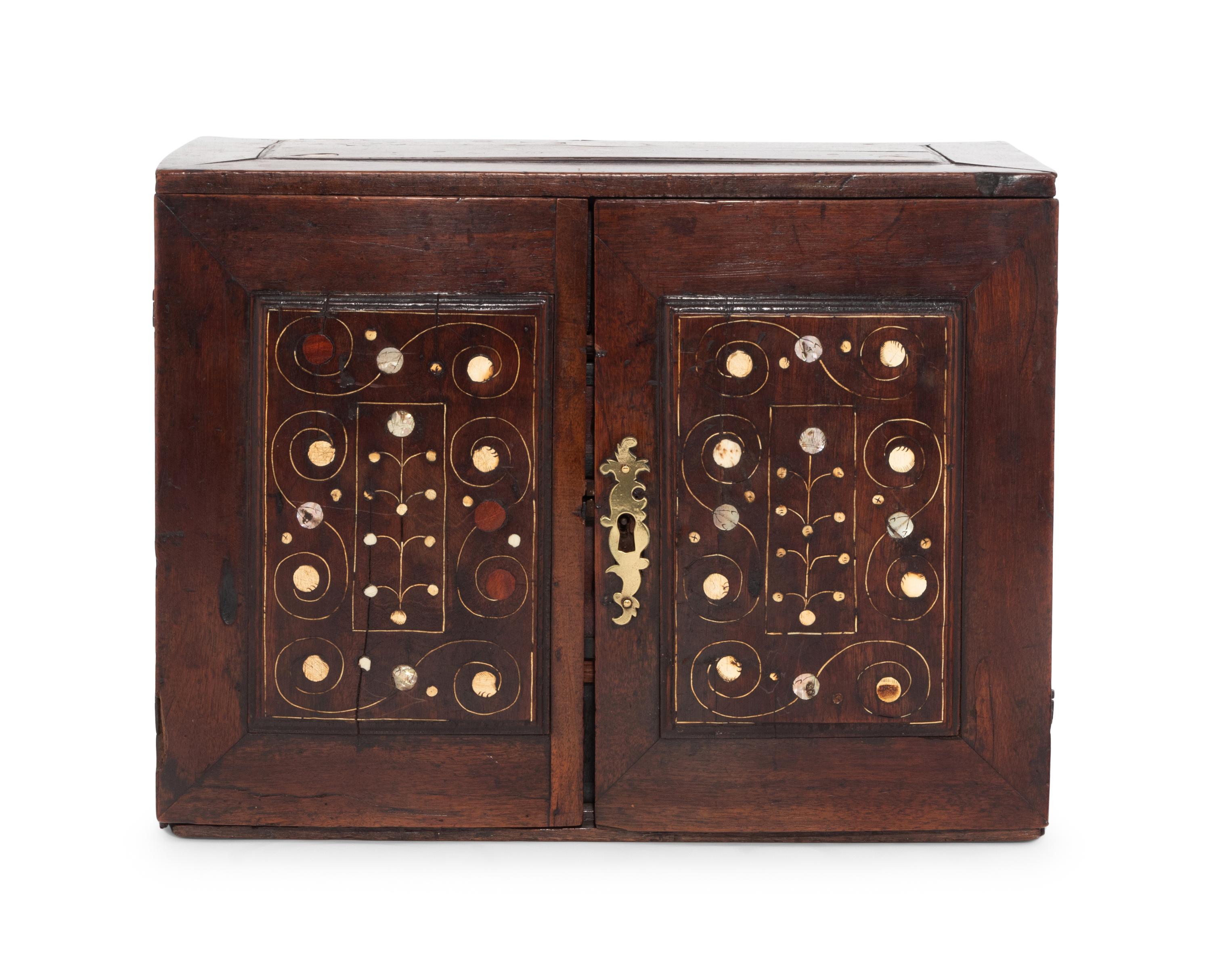 An English Bone and Mother-of-Pearl Inlaid Walnut Table Cabinet