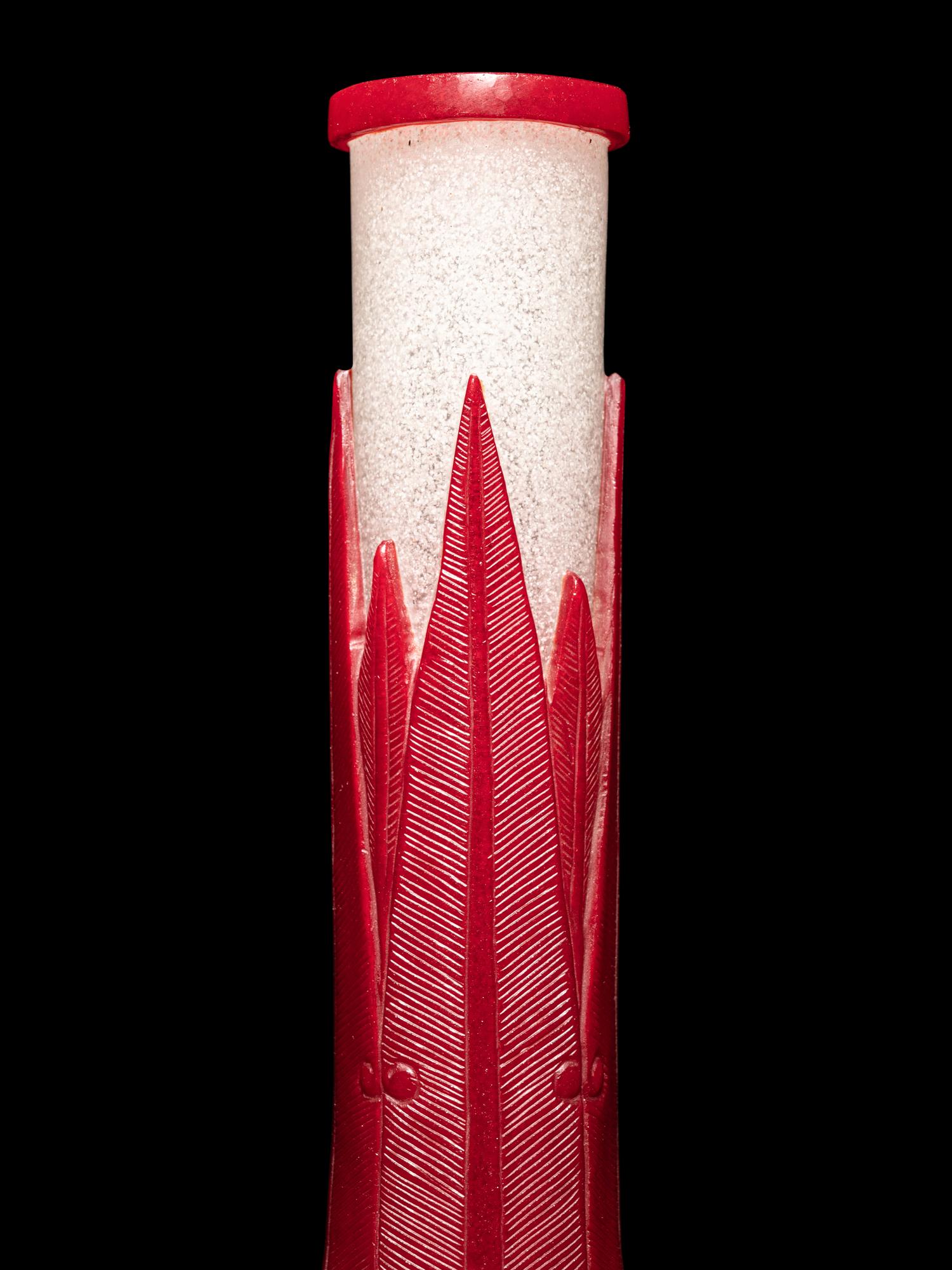 A Chinese Red Overlay Snowflake Ground Peking Glass Bottle Vase
