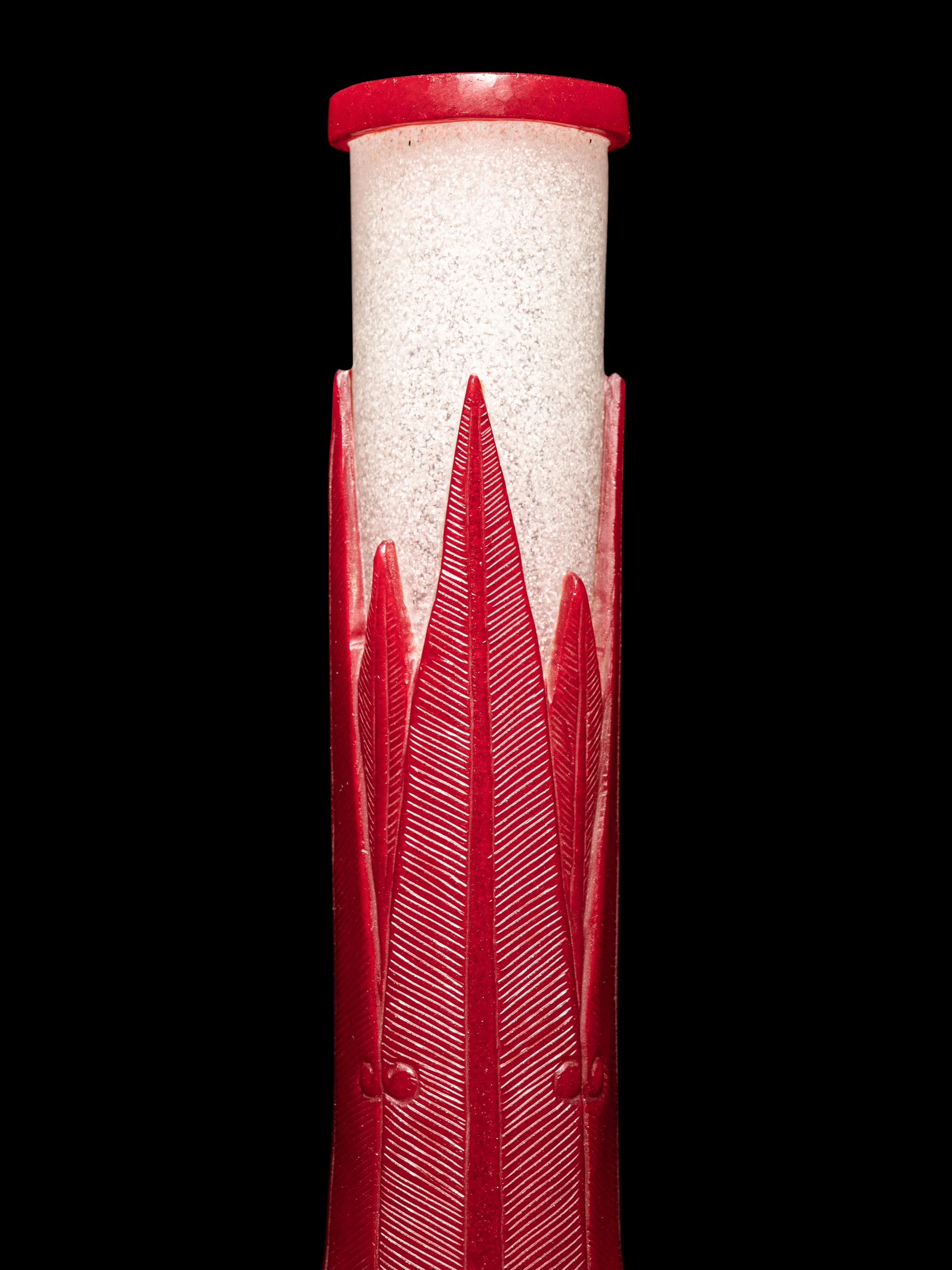 A Chinese Red Overlay Snowflake Ground Peking Glass Bottle Vase