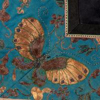 Two Chinese Midnight-Blue Ground Embroidered Silk Lady's Robes, 19th Century 清晚期 石青地綉花女褂兩件