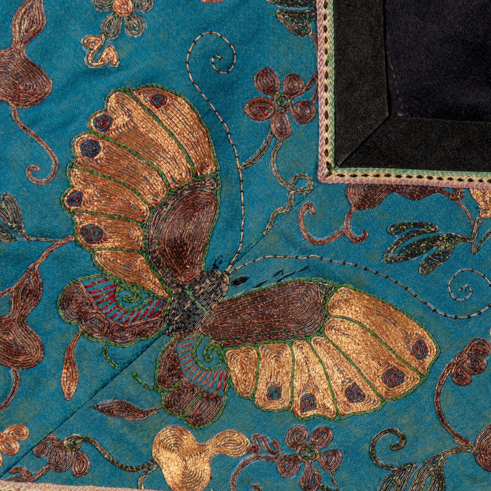 Two Chinese Midnight-Blue Ground Embroidered Silk Lady's Robes, 19th Century 清晚期 石青地綉花女褂兩件