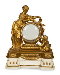A Louis XVI Gilt Bronze Mounted Marble Mantel Clock