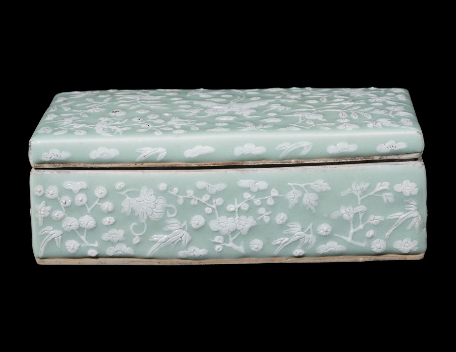 Two Chinese Carved Porcelain Covered Boxes