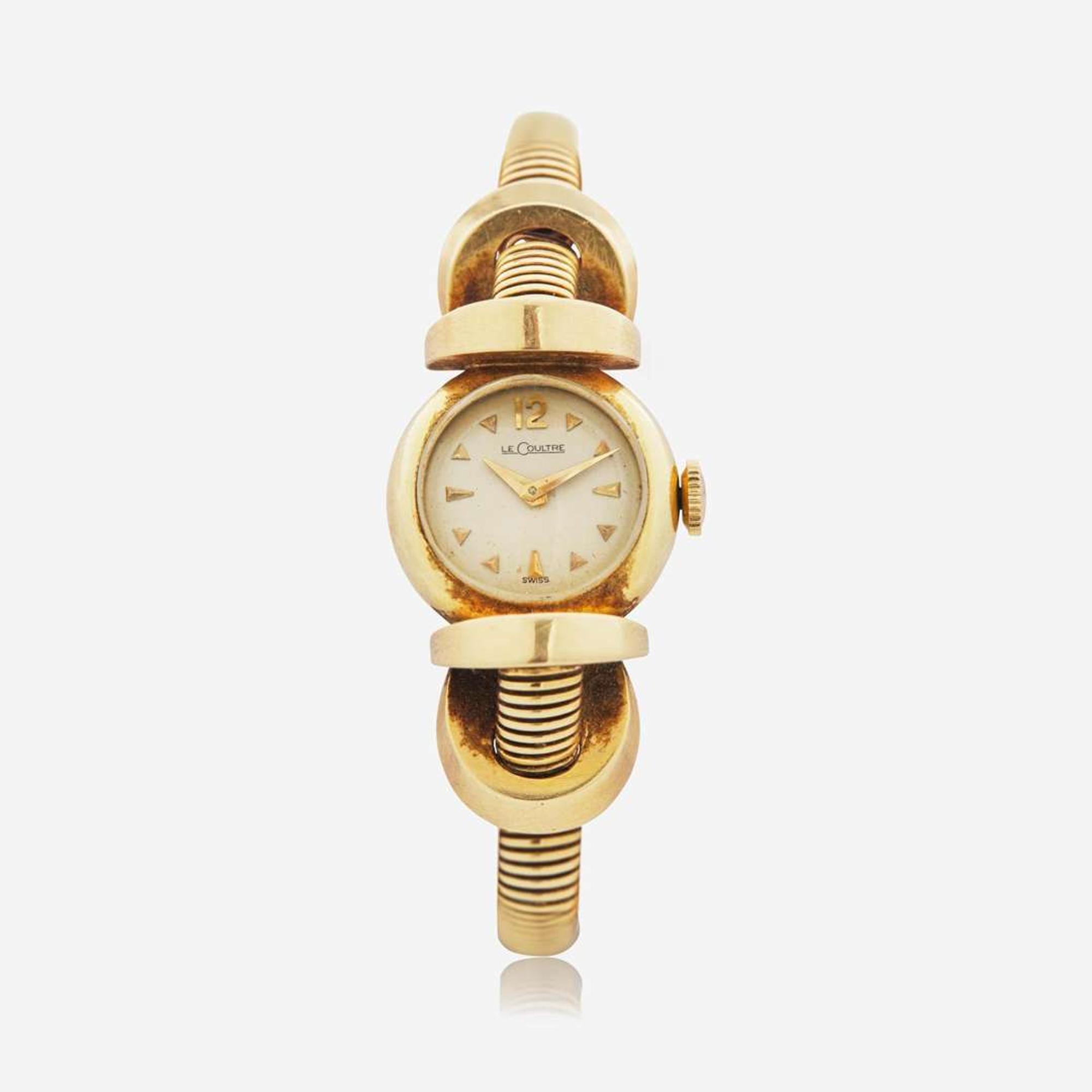 A Ladies 14K Yellow Gold LeCoultre Watch
