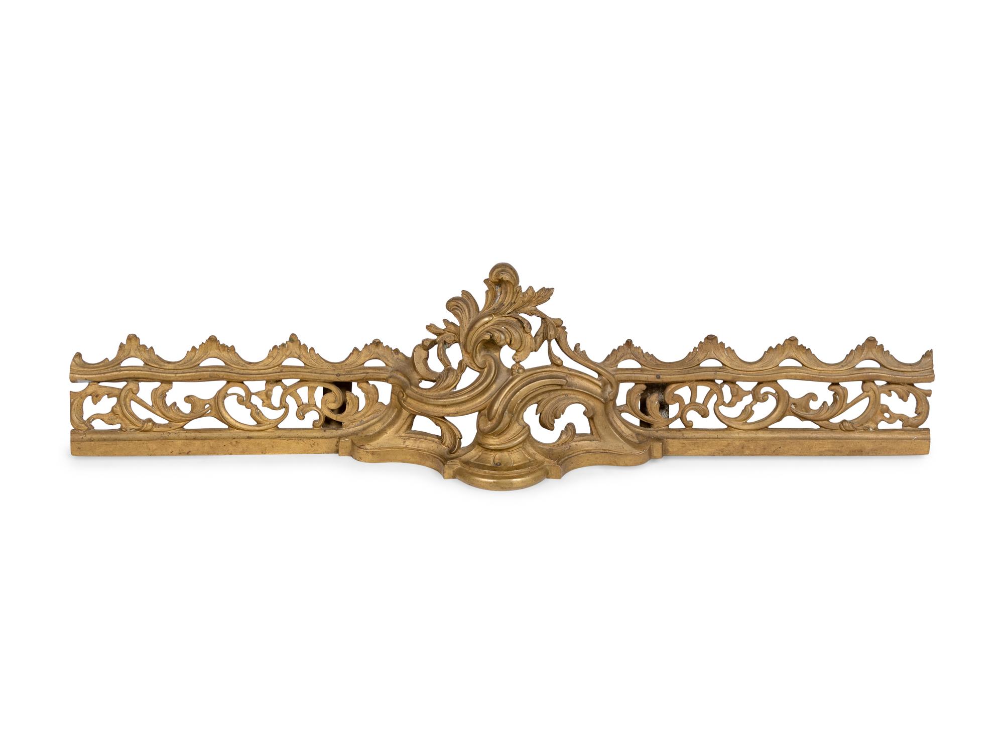 A Pair of Louis XV Style Bronze Andirons with a Fireguard