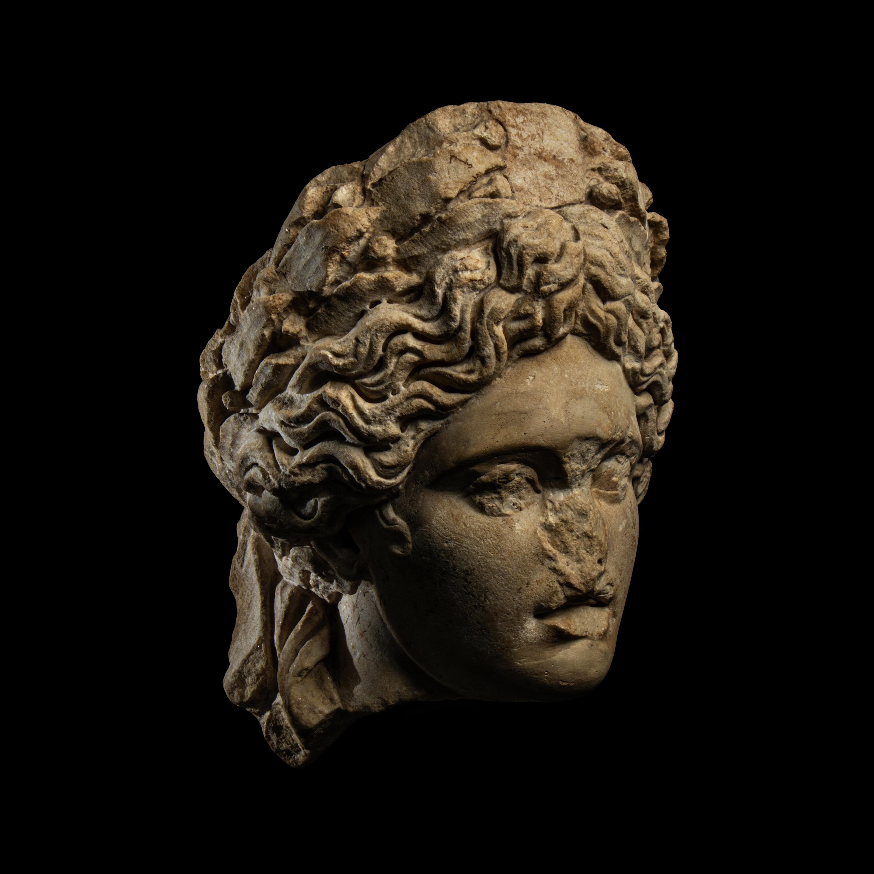 A Roman Marble Head of Apollo Citharoedus