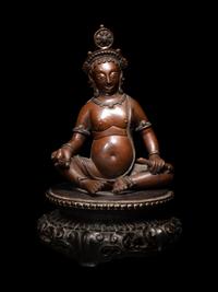 A Nepalese Bronze and Silver Figure of Seated Kubera