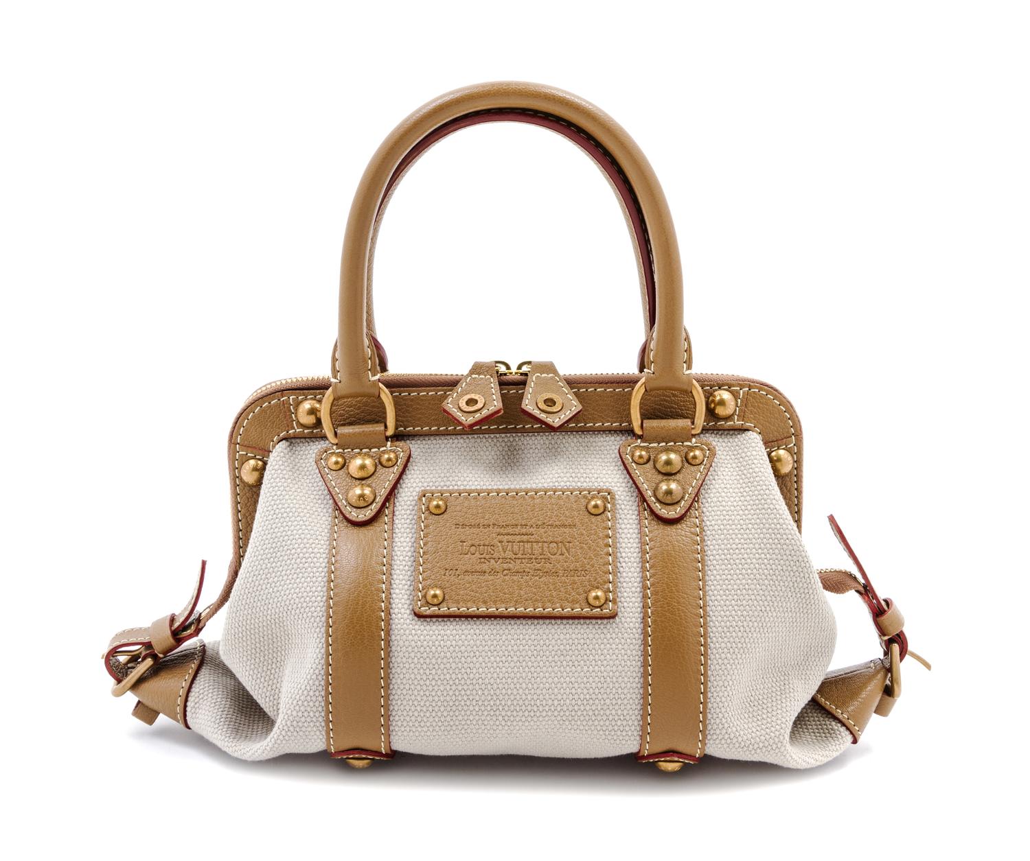 A Louis Vuitton Toile Trianon Canvas Leather Inventeur Sac de Nuit Bag, 13 x 6 x 6 inches.