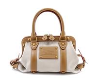A Louis Vuitton Toile Trianon Canvas Leather Inventeur Sac de Nuit Bag, 13 x 6 x 6 inches.