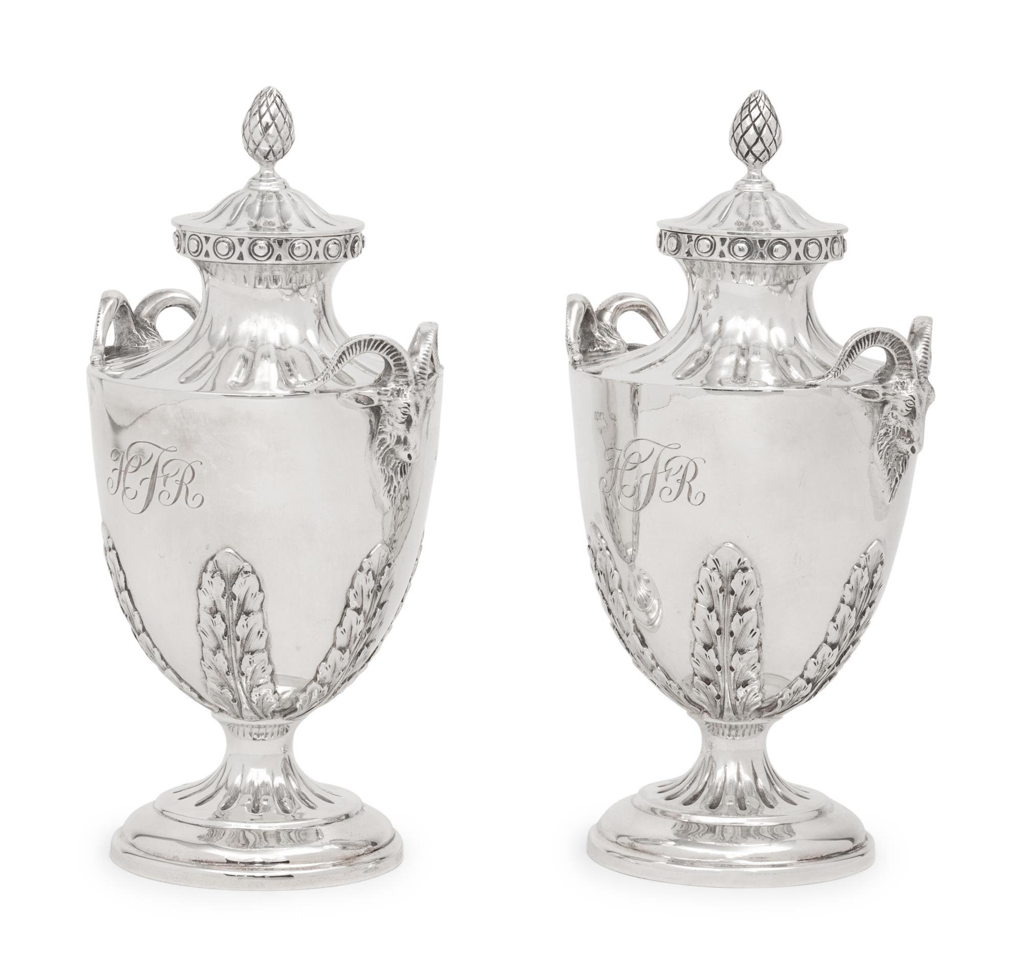 A Pair of English Silver Covered Vases