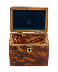 An English Tortoise Shell Veneered Tea Caddy, Height 3 3/4 x width 4 3/4 x depth 3 3/8 inches.
