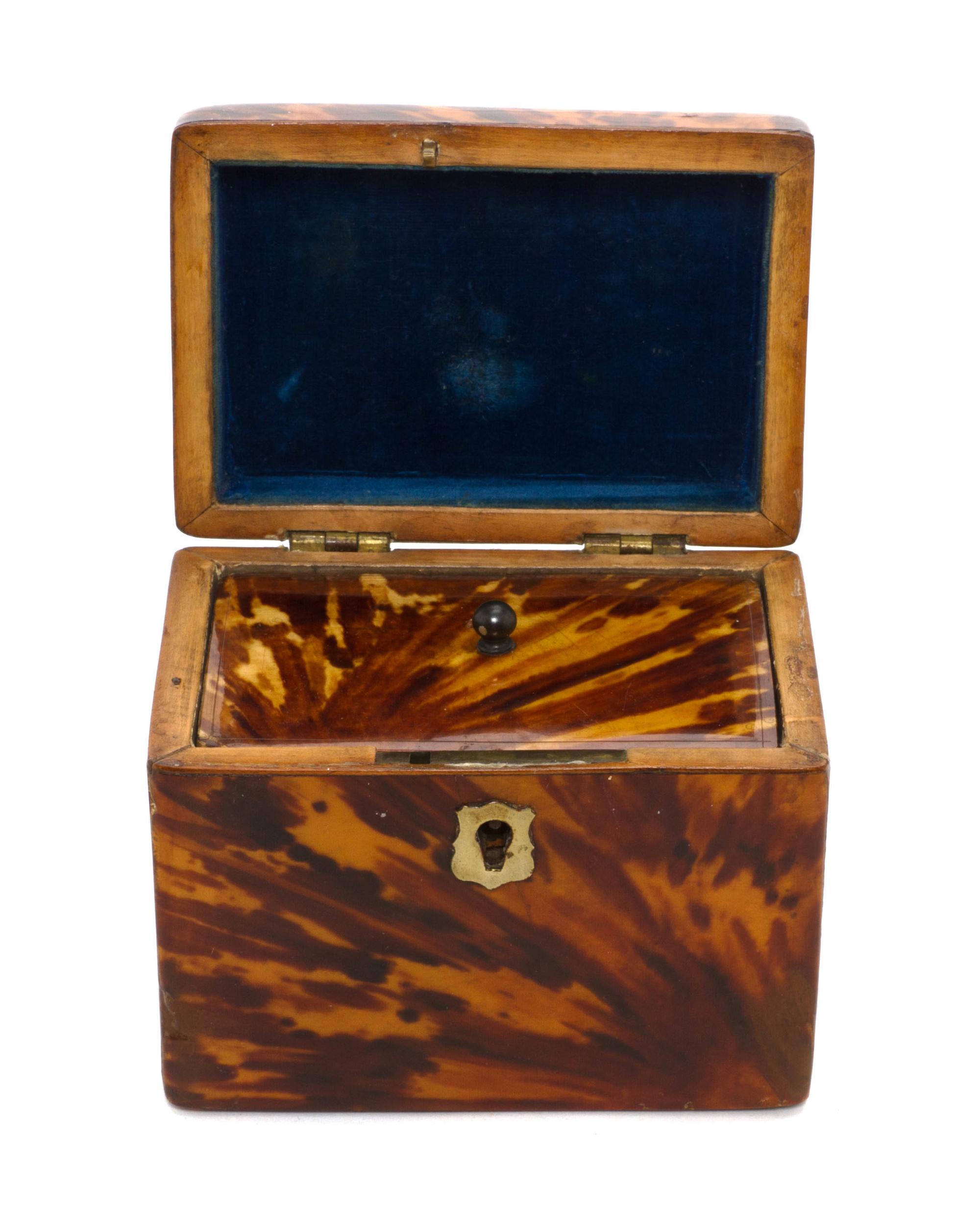 An English Tortoise Shell Veneered Tea Caddy, Height 3 3/4 x width 4 3/4 x depth 3 3/8 inches.