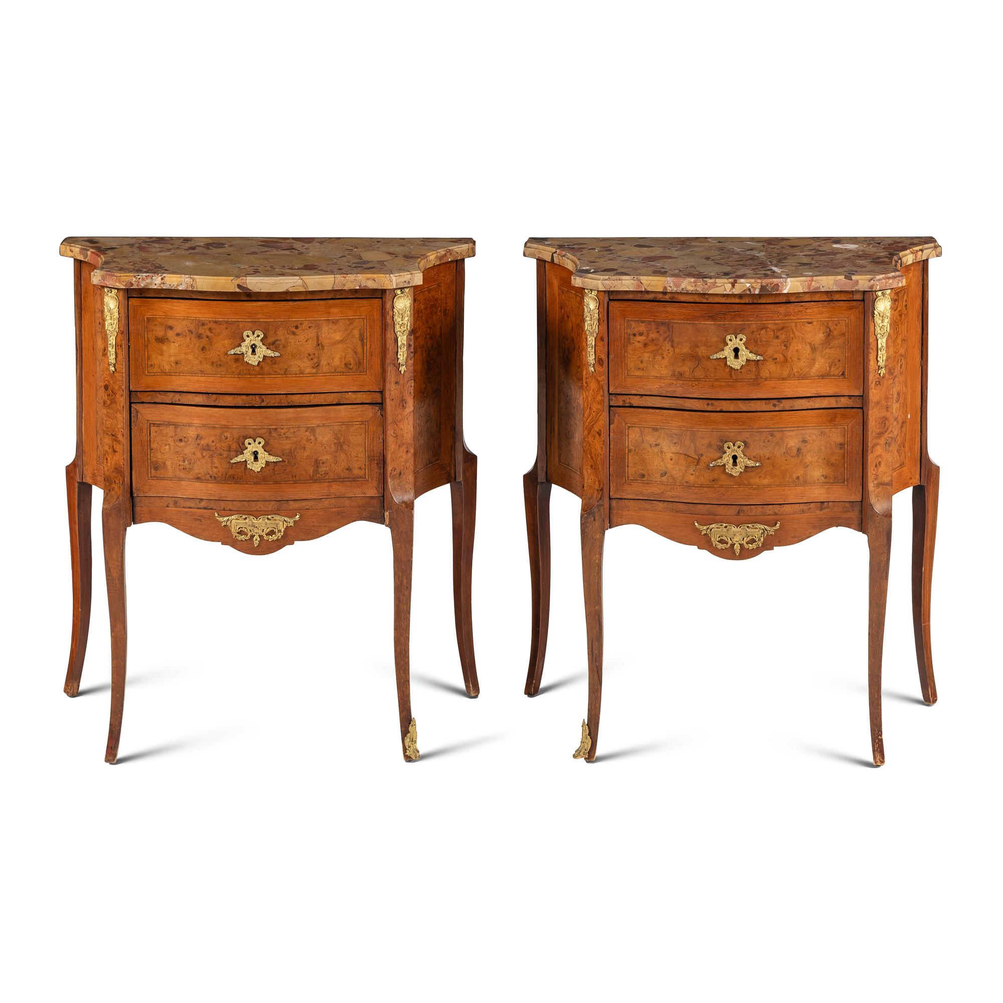 A Pair of Louis XV/XVI Transitional Style Gilt Bronze Mounted Walnut and Marble-Top Commodes