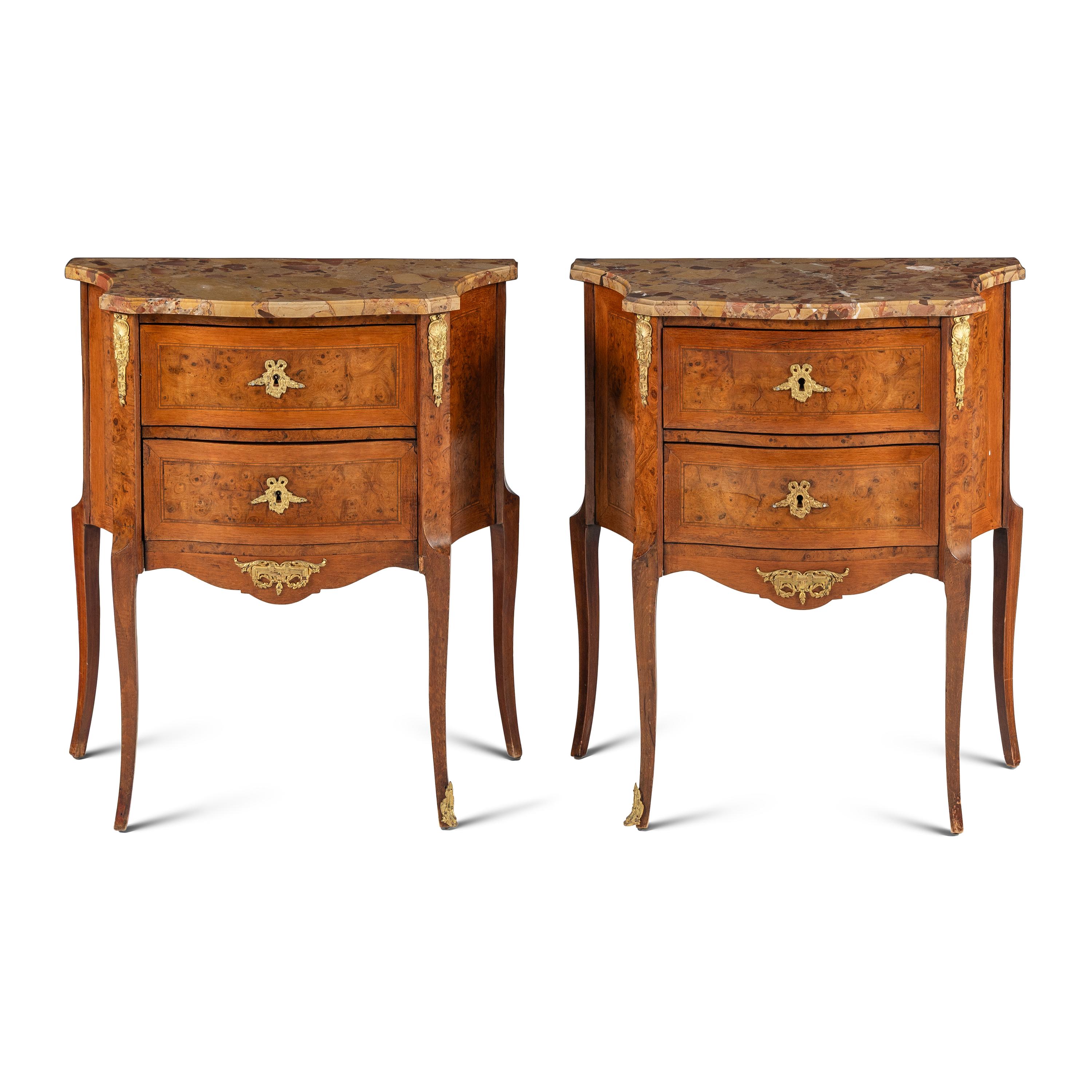 A Pair of Louis XV/XVI Transitional Style Gilt Bronze Mounted Walnut and Marble-Top Commodes