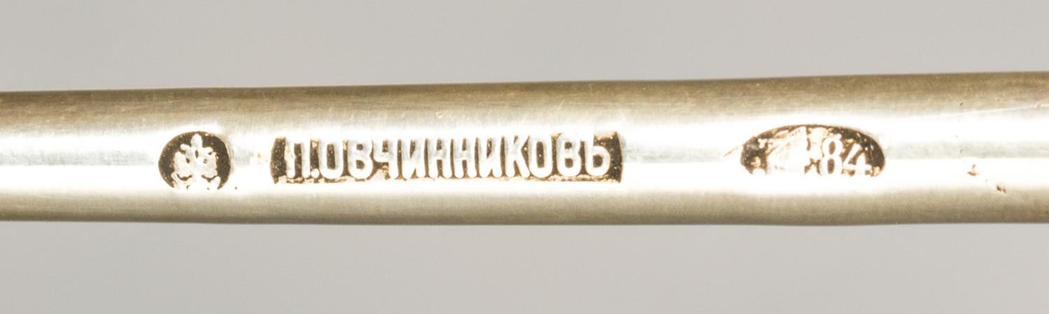 A Russian Silver and Enamel Serving Spoon, Mark of Pavel Ovchinnikov with Imperial warrant, Moscow, late 19th century, having a blue en
