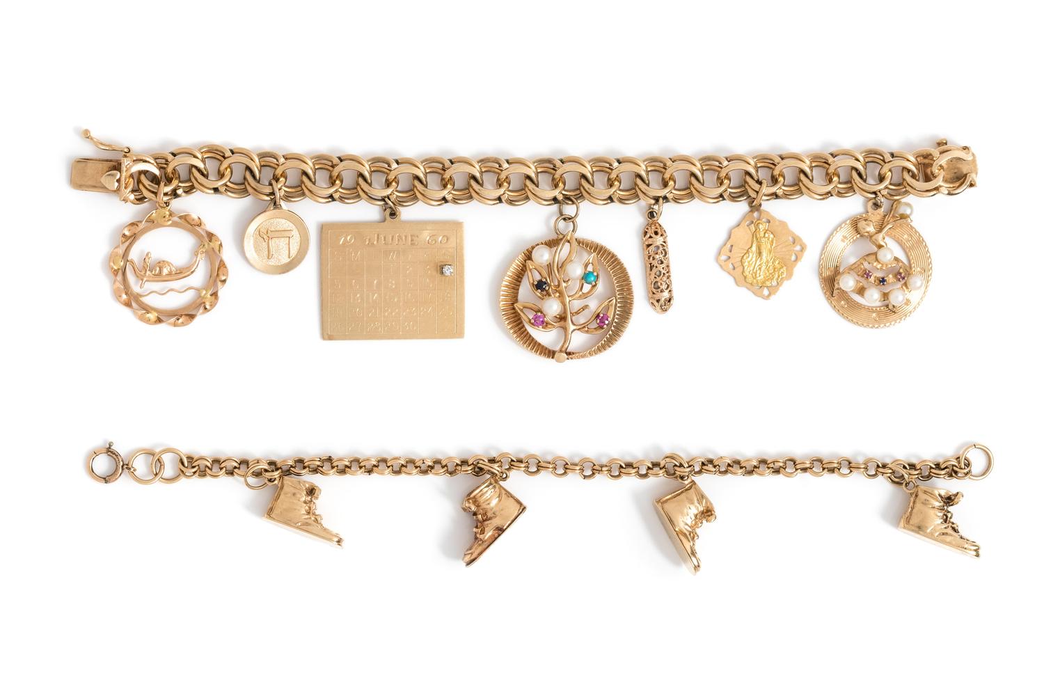 COLLECTION OF YELLOW GOLD CHARM BRACELETS