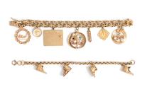 COLLECTION OF YELLOW GOLD CHARM BRACELETS
