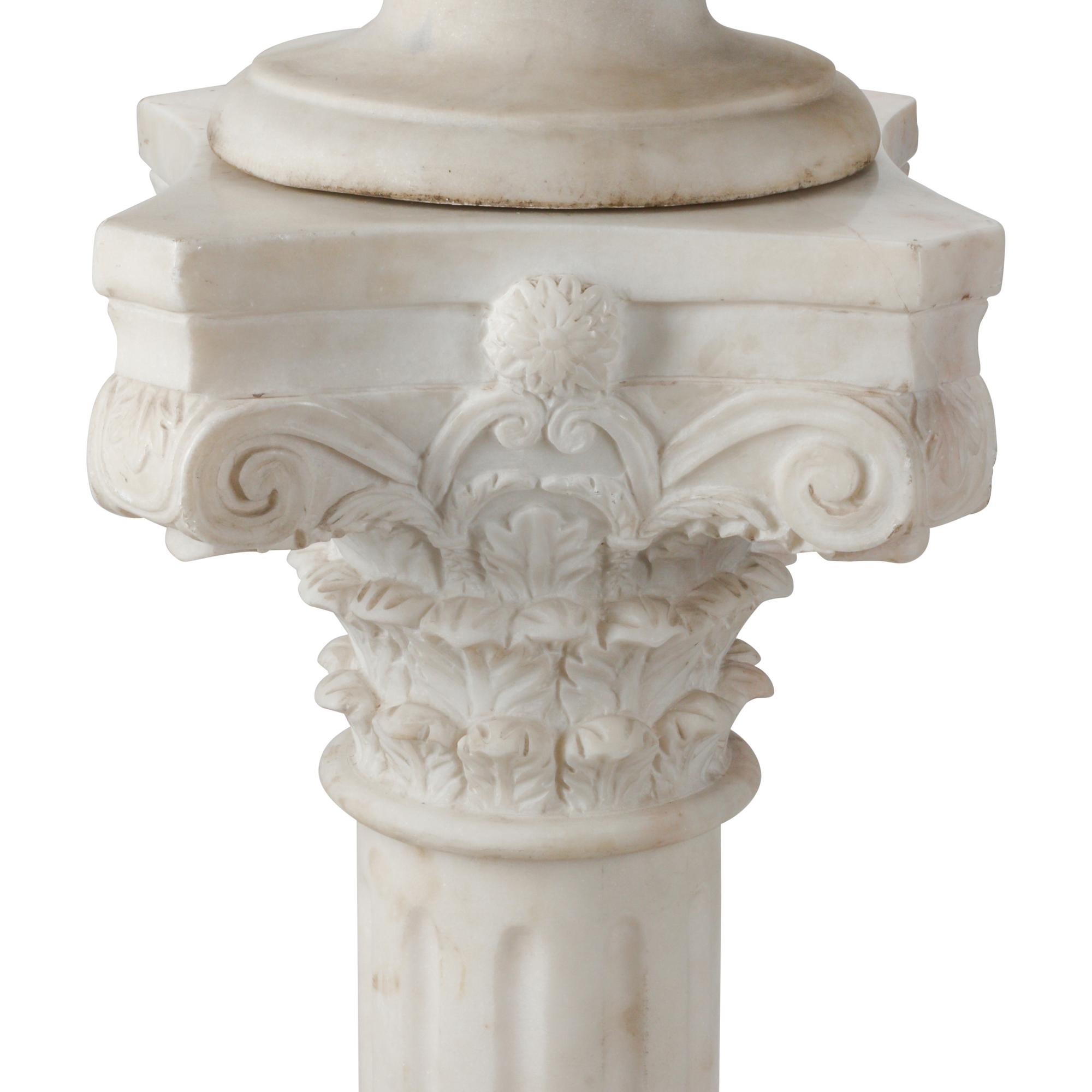 An Italian Carved Marble Bust of a Woman on an Associated Pedestal