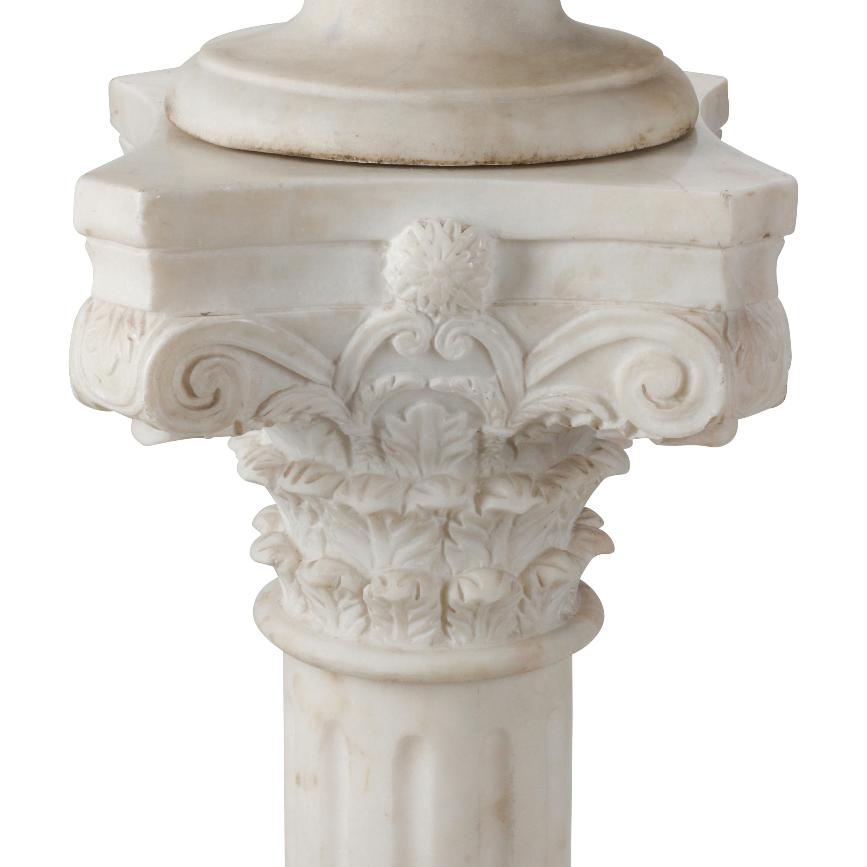 An Italian Carved Marble Bust of a Woman on an Associated Pedestal